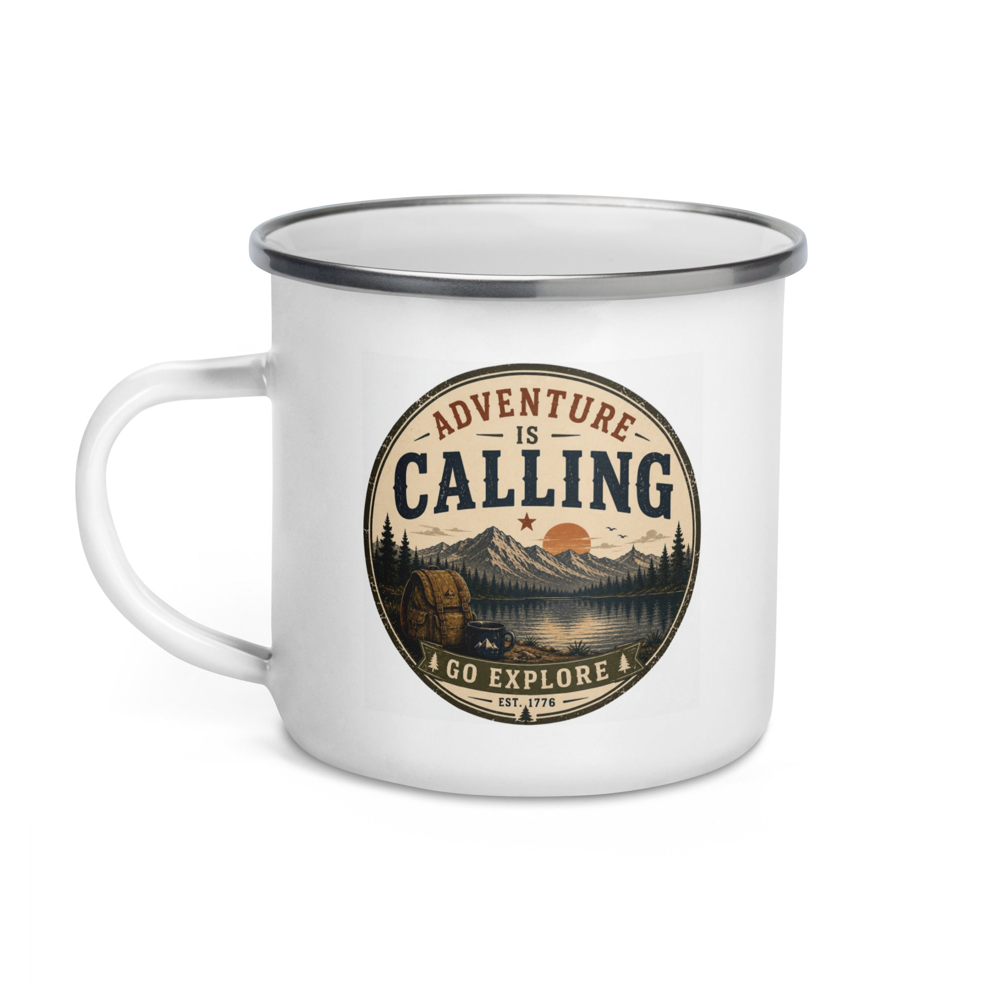White enamel mug with silver rim, “Adventure is Calling” badge and forest scene.
