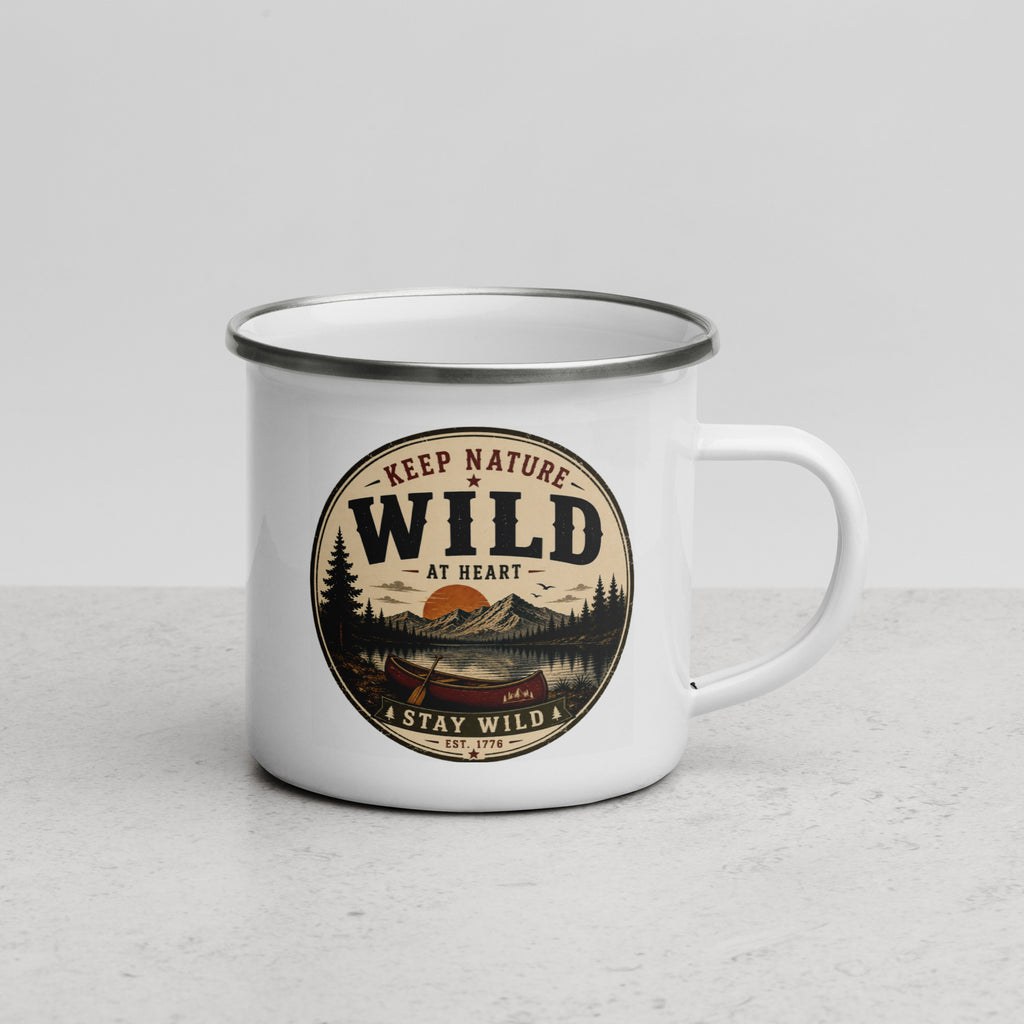White enamel mug with Wild logo, gray rim and side handle on light stone