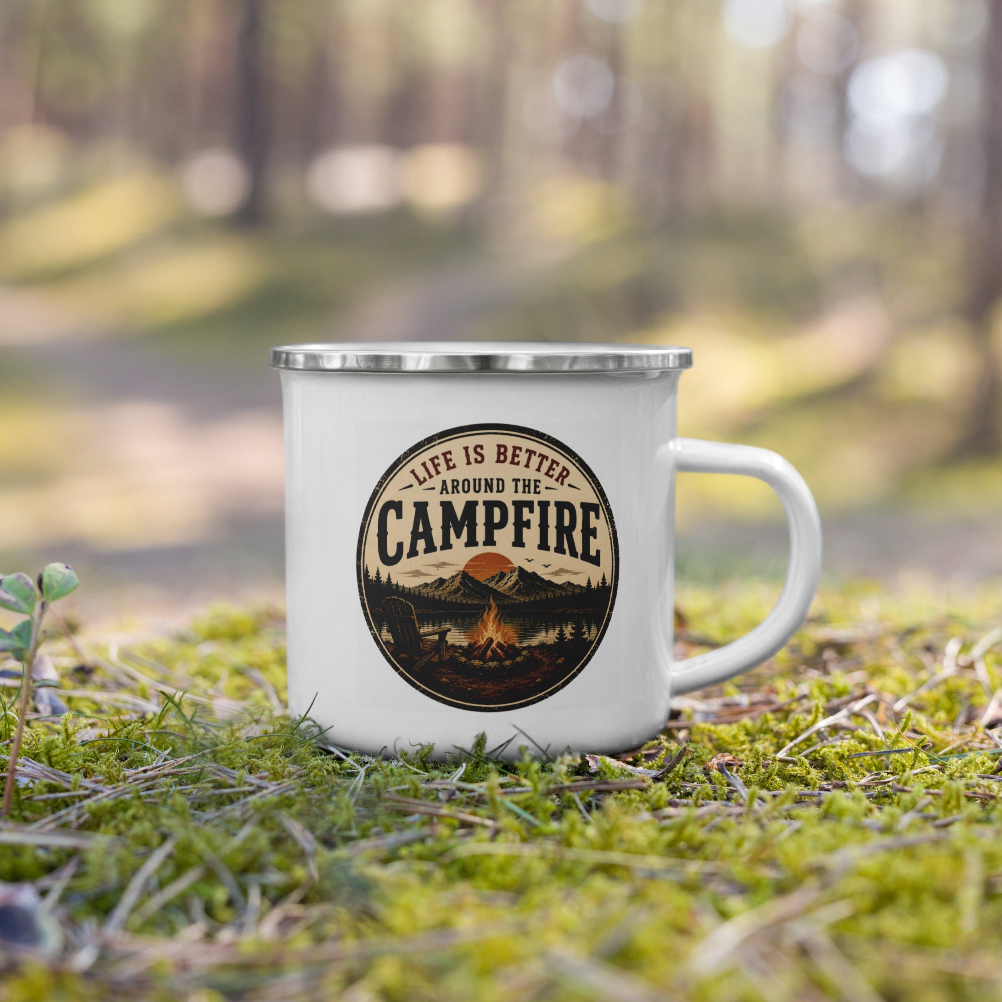 White enamel mug with silver rim and Campfire logo, on outdoor grass