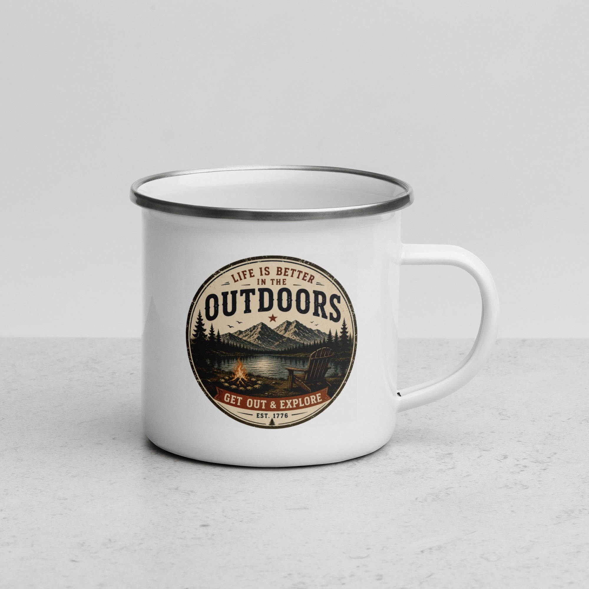 White enamel mug with silver rim and handle, Outdoors logo graphic on front