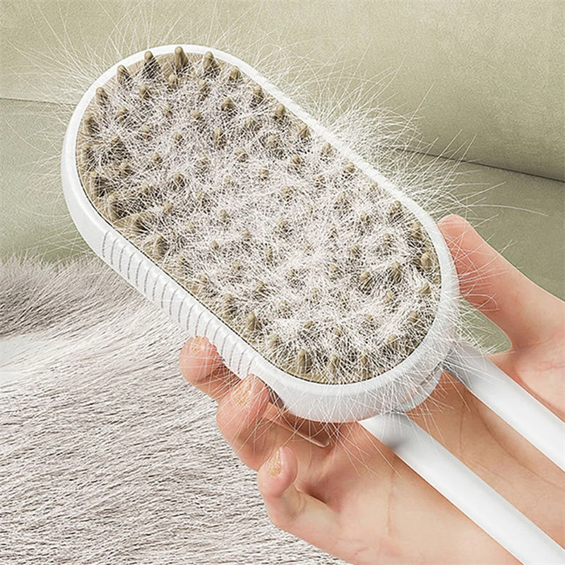White pet grooming brush with orange bristles, shown with fur on the comb pad