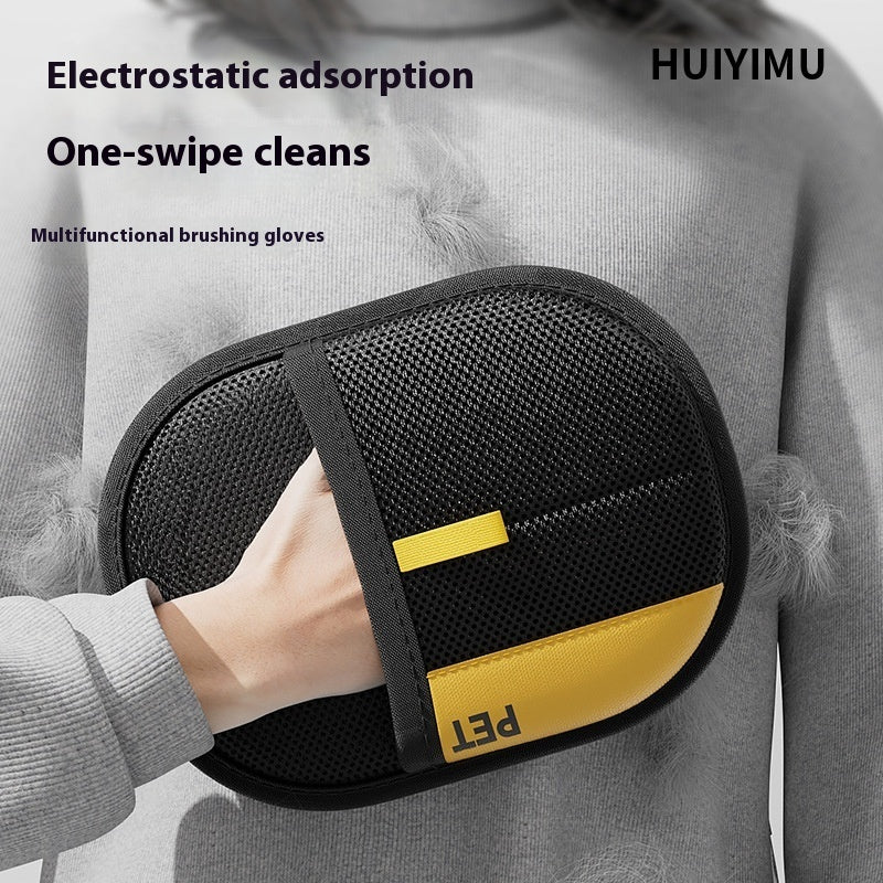 Black and yellow electrostatic pet hair removal brush pad with textured cleaning surface