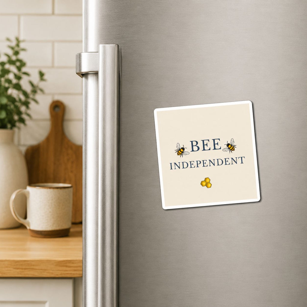 Bee-themed refrigerator magnet showing 'BEE INDEPENDENT' and two honeycomb bees