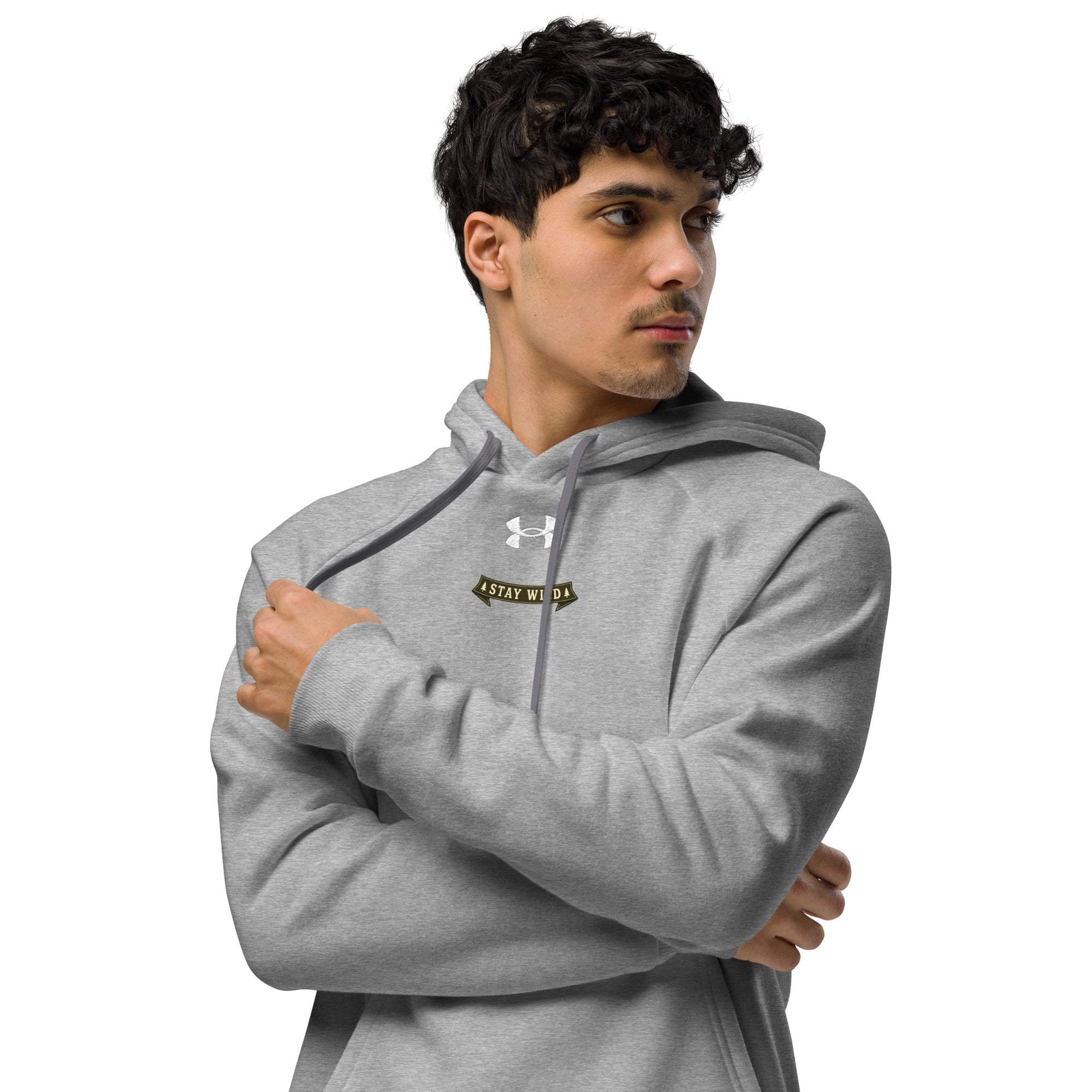 Under Armour grey pullover hoodie on model with chest emblem and hood strings