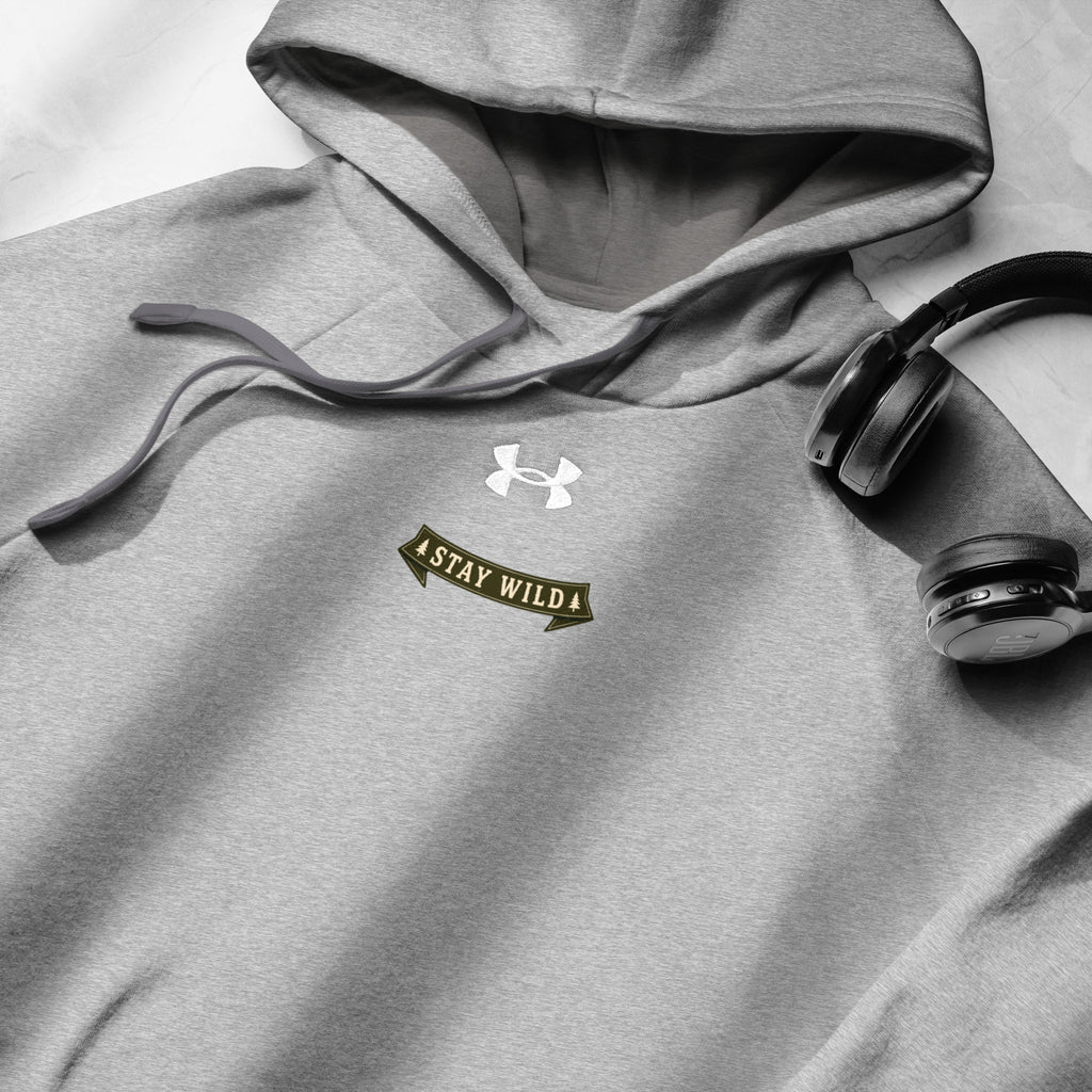 Gray Under Armour hoodie with chest logo and "Stay Wild" badge