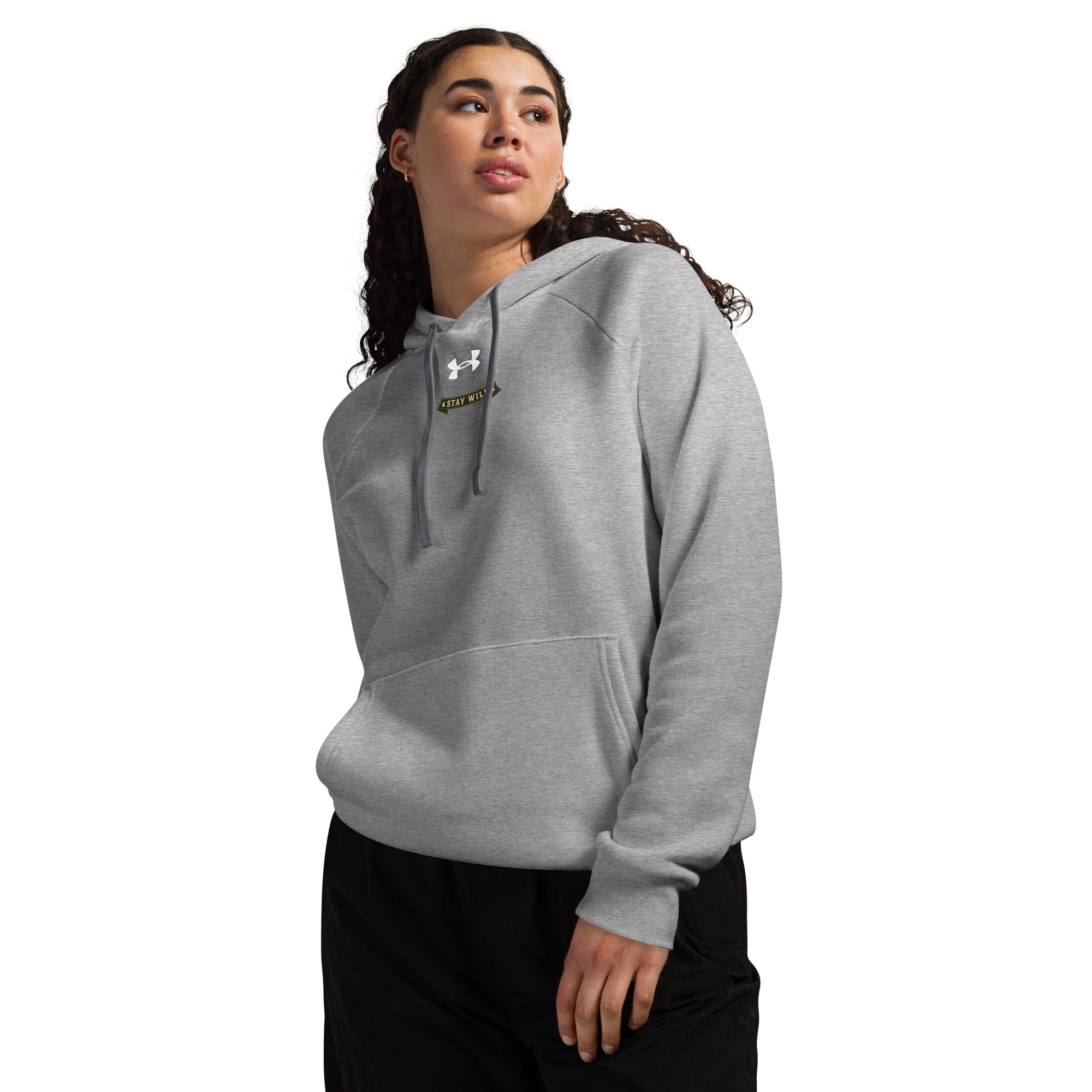 Under Armour grey pullover hoodie on model with front logo and drawstring hood