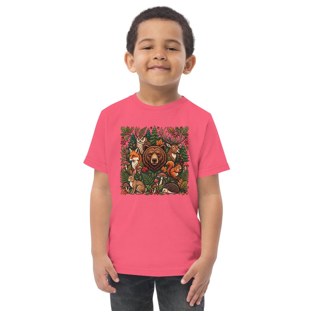 Hot pink toddler T-shirt on child model with colorful woodland wildlife front graphic.