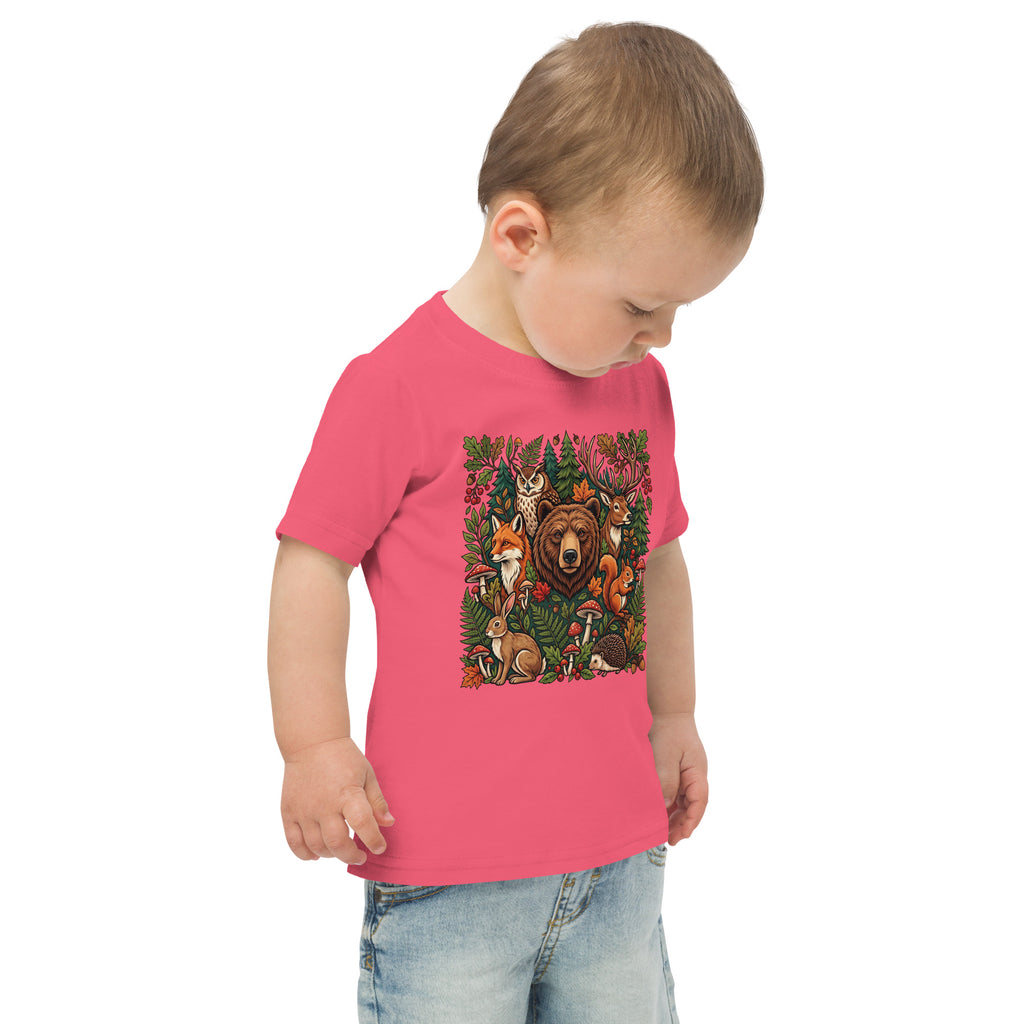 Toddler jersey T-shirt in hot pink with woodland wildlife animal graphic, side view