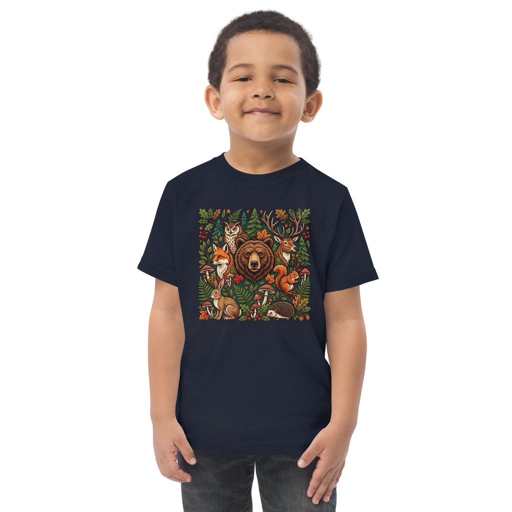 Navy toddler T-shirt on child model with colorful woodland wildlife front graphic.