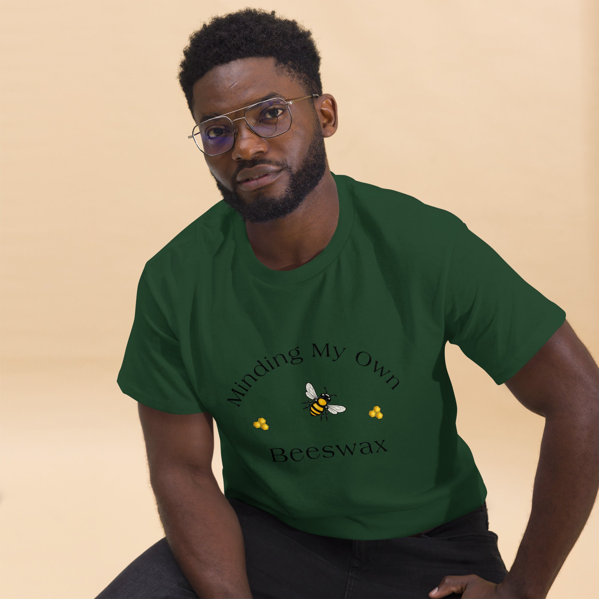 Unisex classic tee in forest green with bee and text graphic on chest
