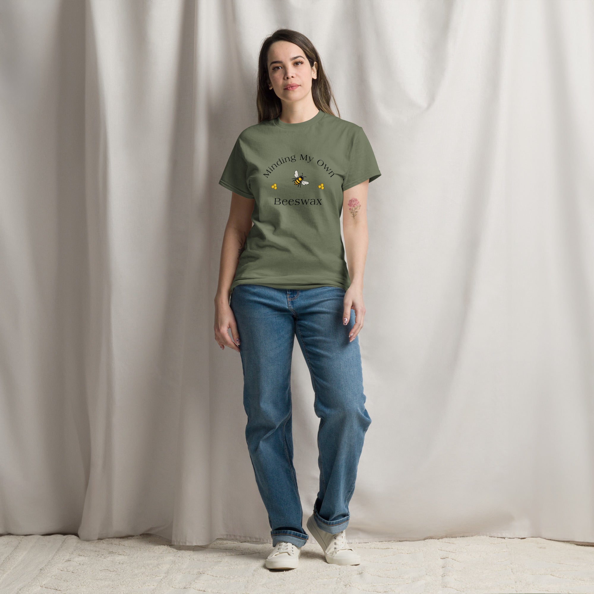 Olive unisex T-shirt with round neck and centered bee graphic with text.