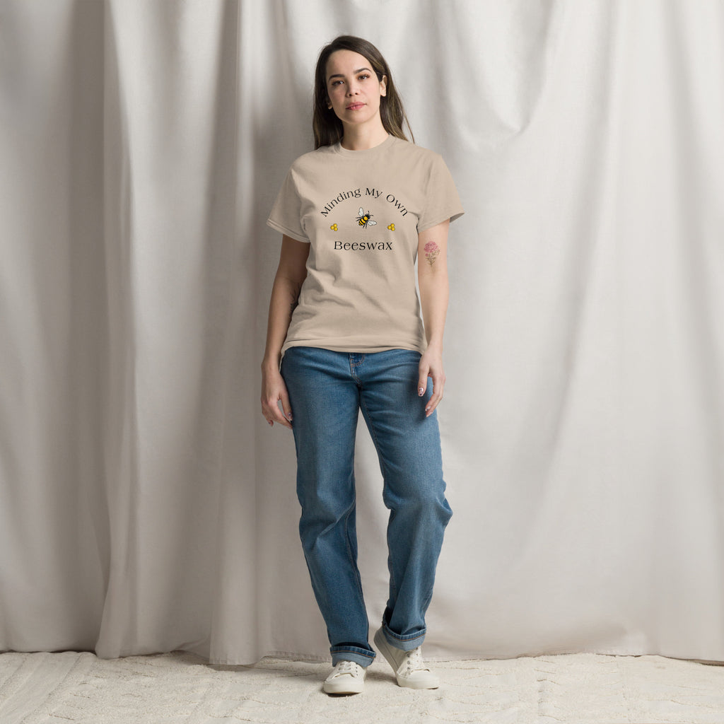 Tan unisex T-shirt with round neck and bee graphic with text on chest.