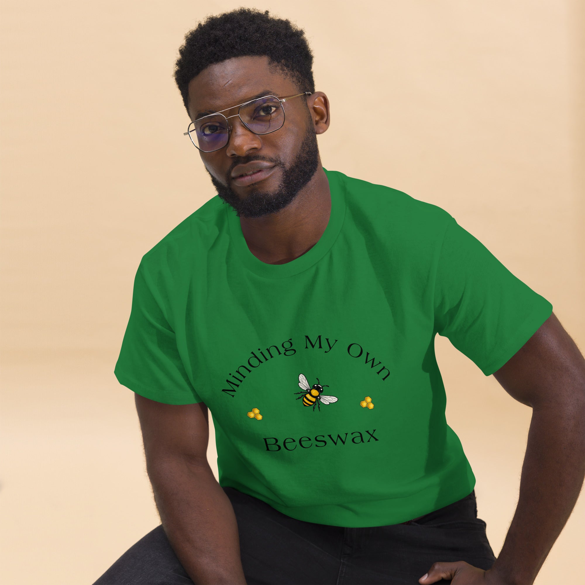 Unisex classic tee in forest green with bee and text graphic on chest