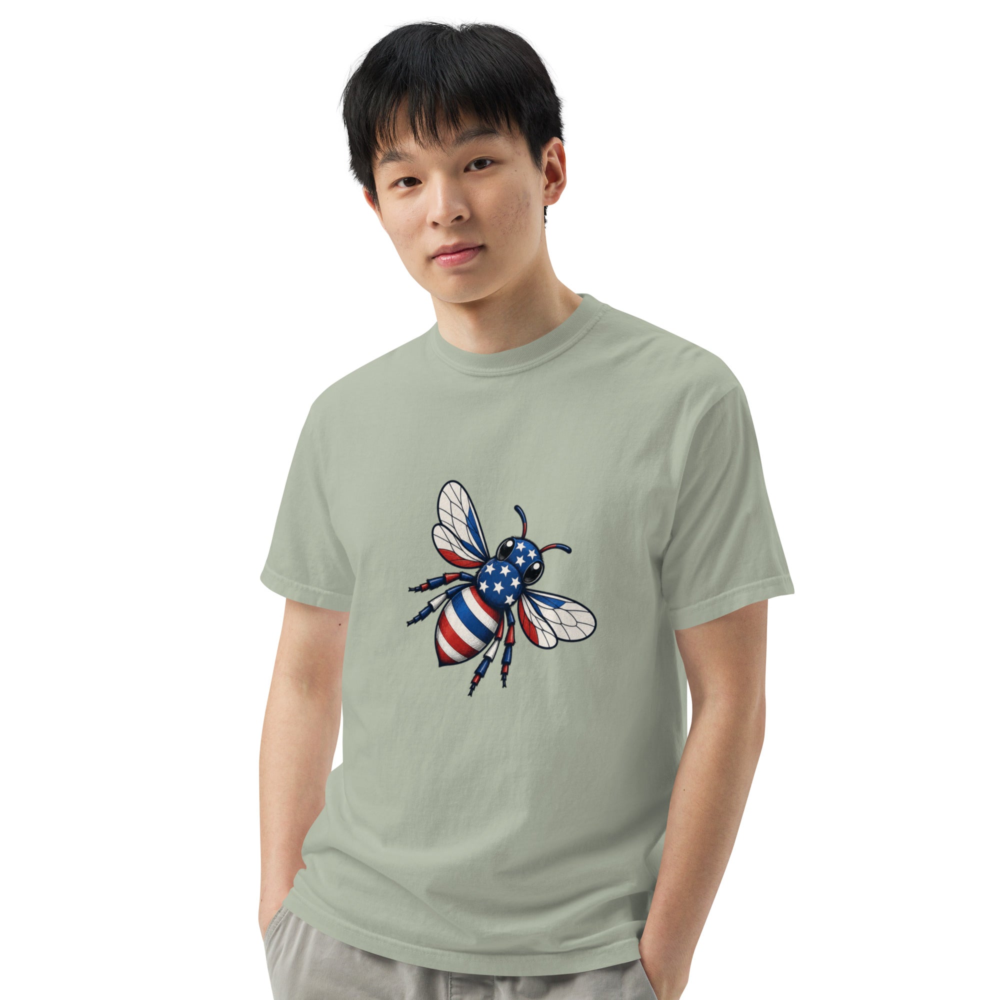 Unisex heavyweight T-shirt, sage green front view with blue-red bee graphic