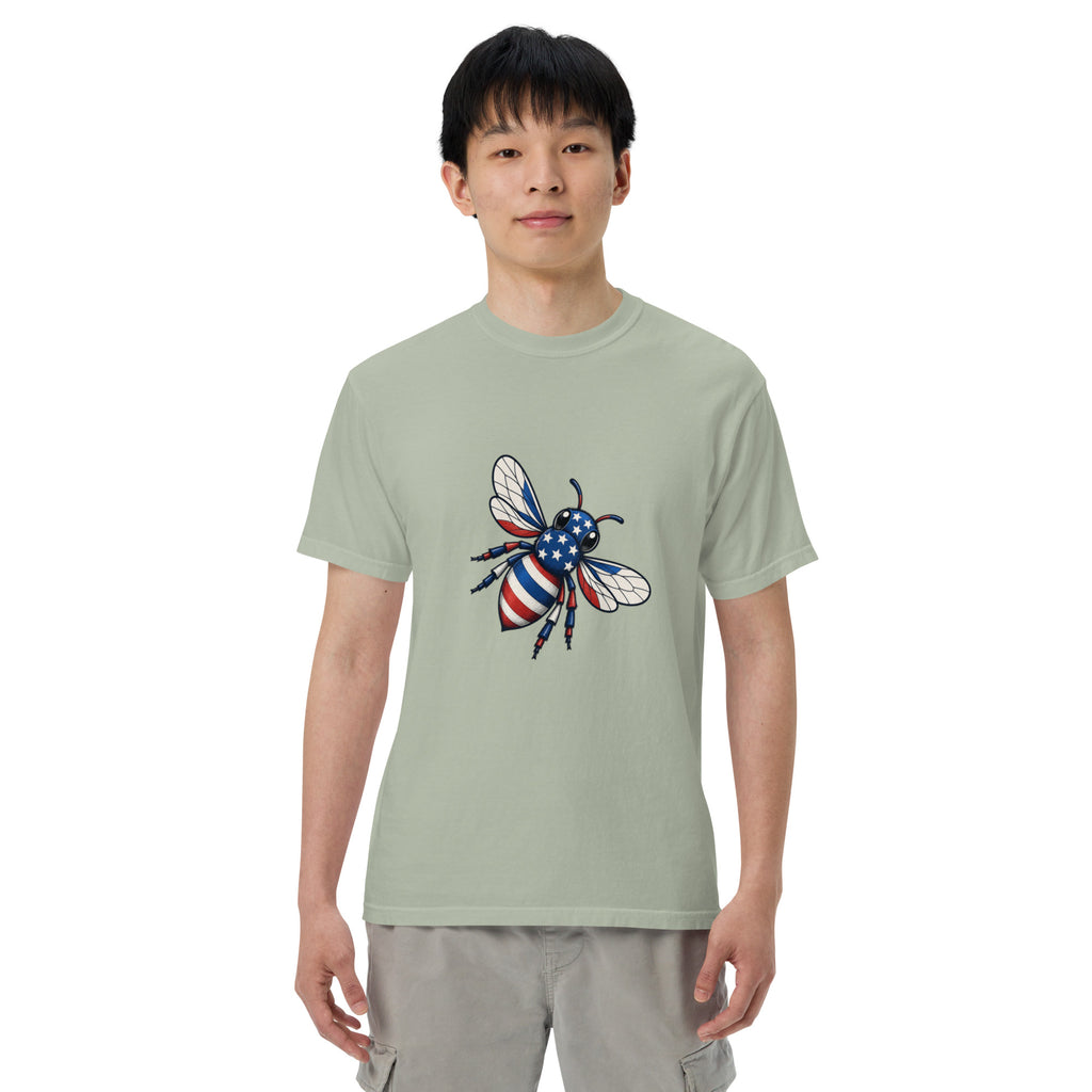 Heavyweight unisex T-shirt, sage green with front graphic of a blue-and-white bee and stars
