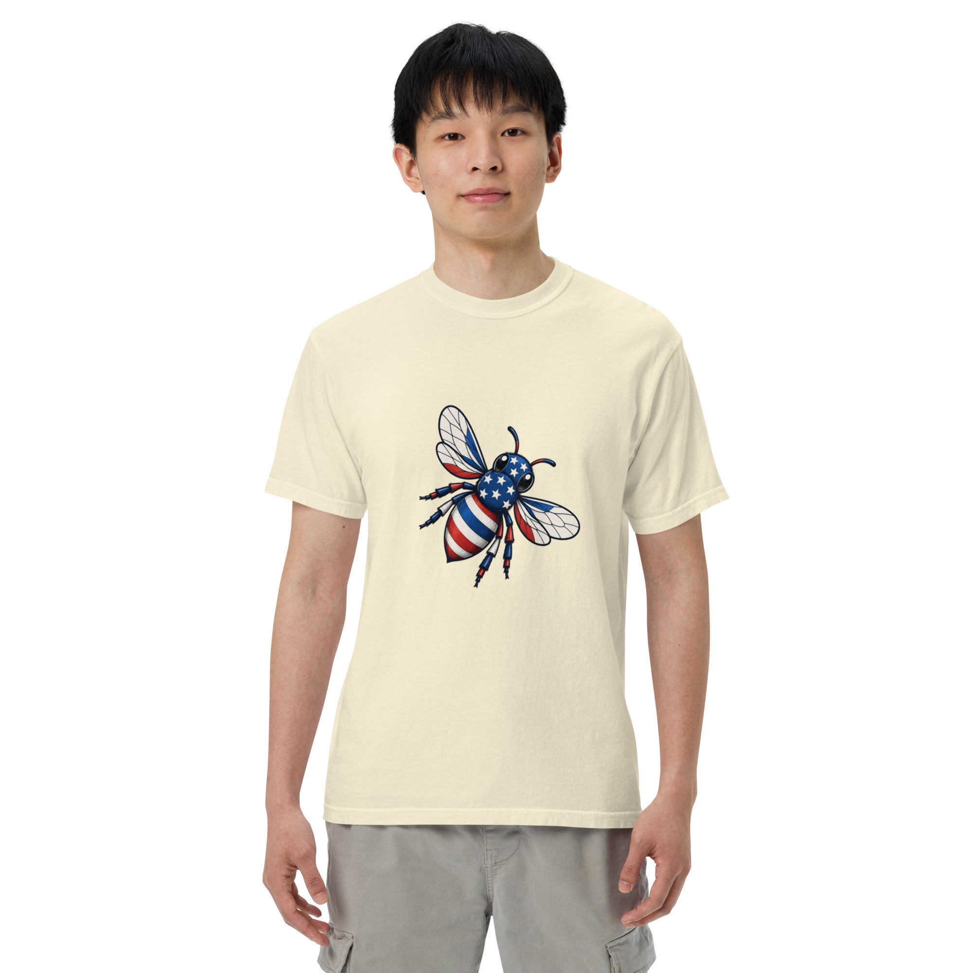 Heavyweight unisex T-shirt, ivory/cream with front graphic of a blue-and-white bee and stars