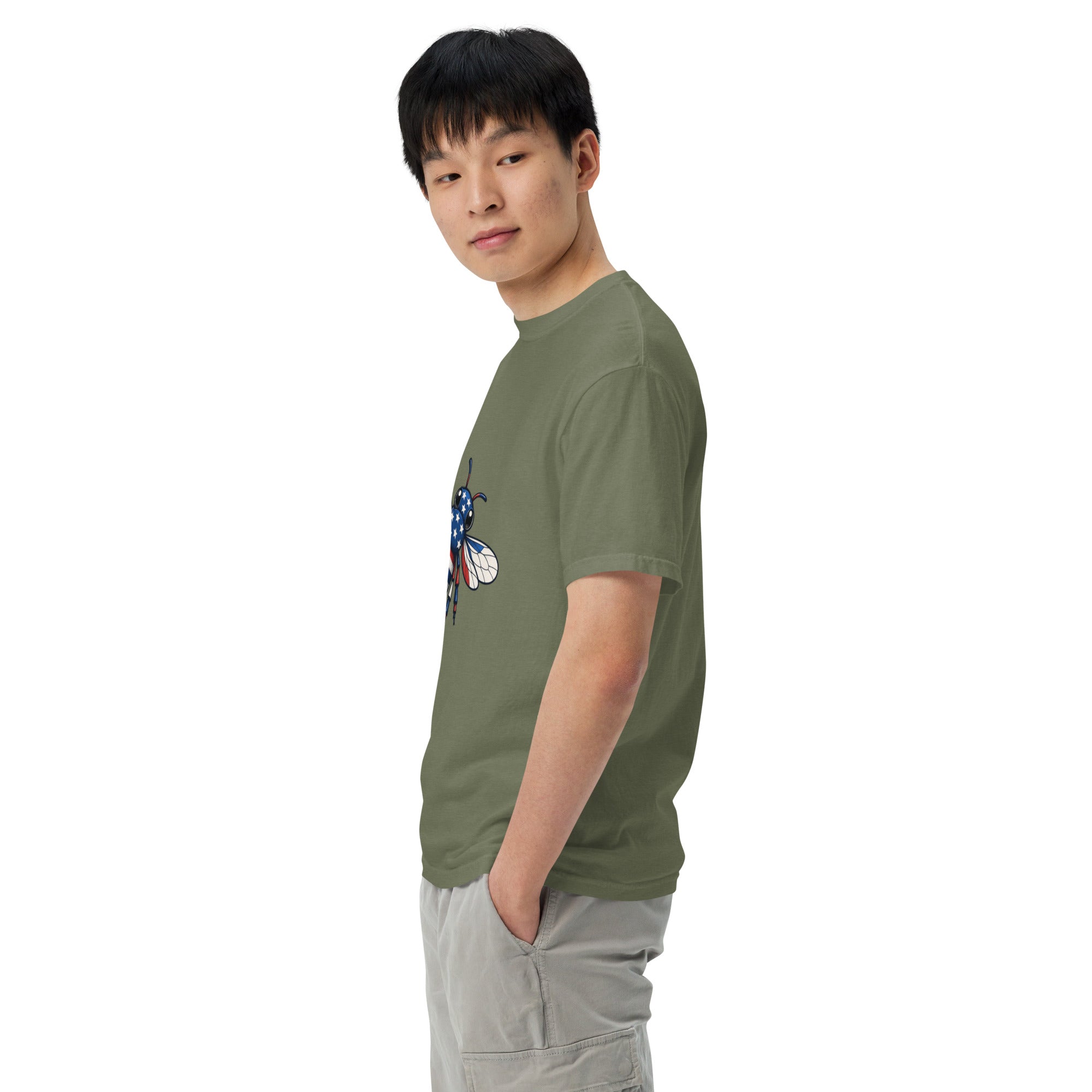 Unisex heavyweight T-shirt, sage green side view with blue-red bee graphic