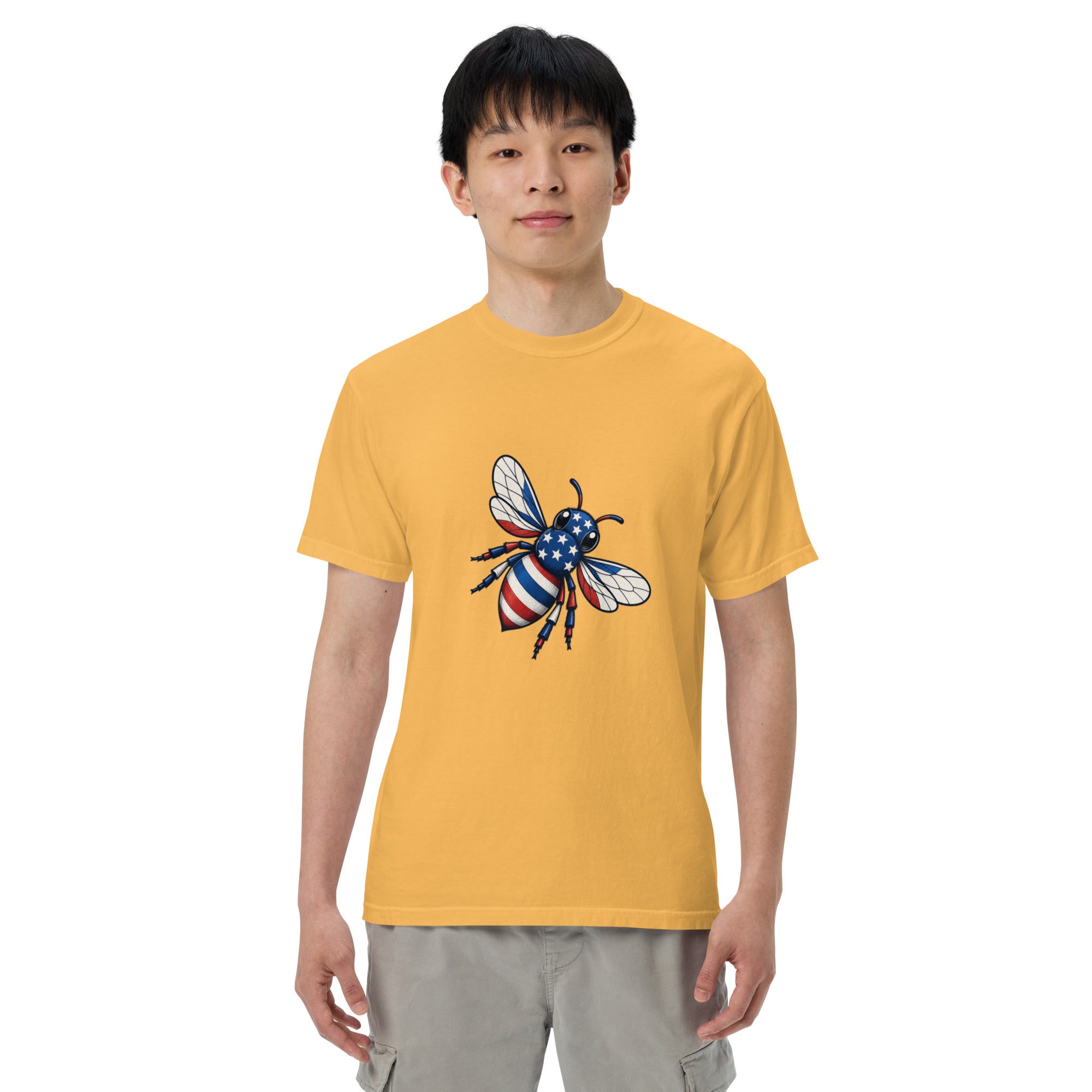 Heavyweight unisex T-shirt, mustard yellow with front graphic of a blue-and-white bee and stars