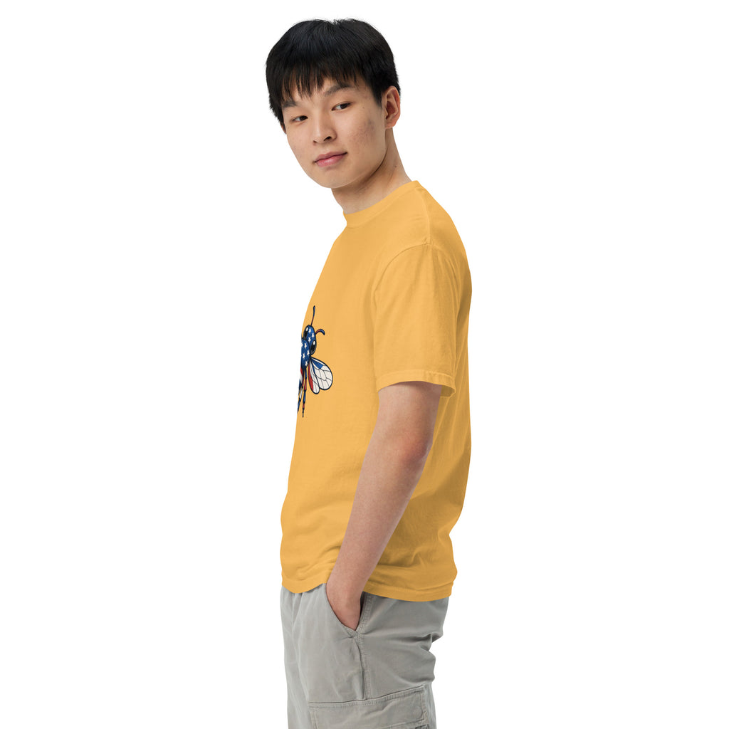 Unisex heavyweight T-shirt, mustard yellow side view with blue-red bee graphic