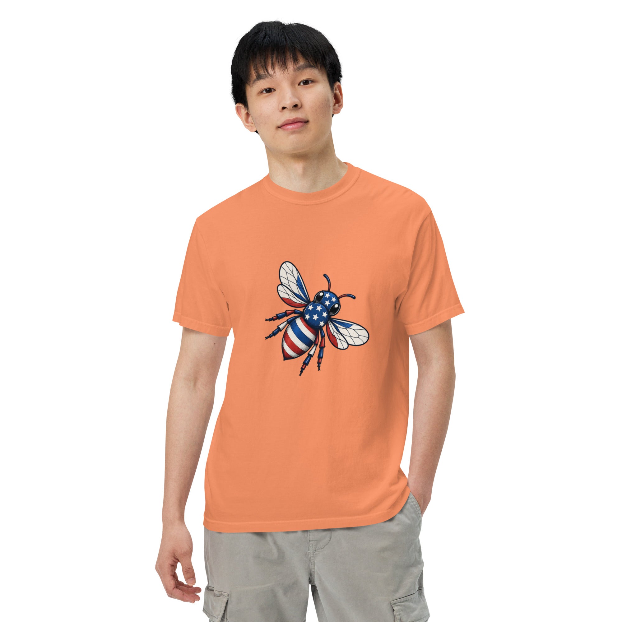 Orange unisex heavyweight T-shirt with colorful bee graphic on chest
