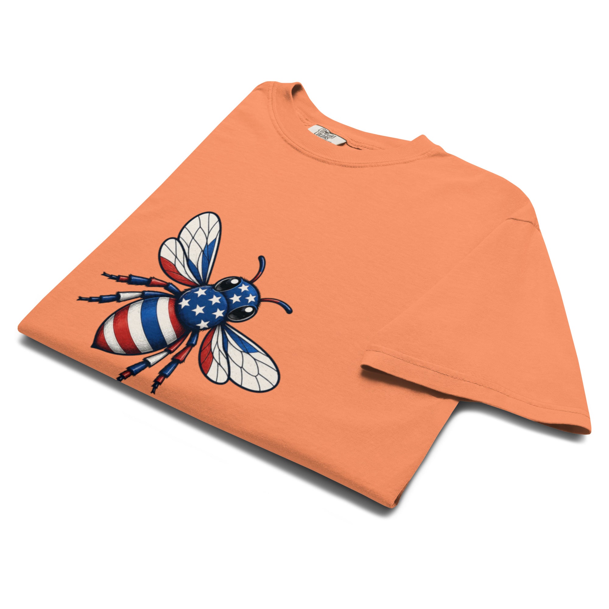 Unisex heavyweight T-shirt in orange with bee graphic on chest