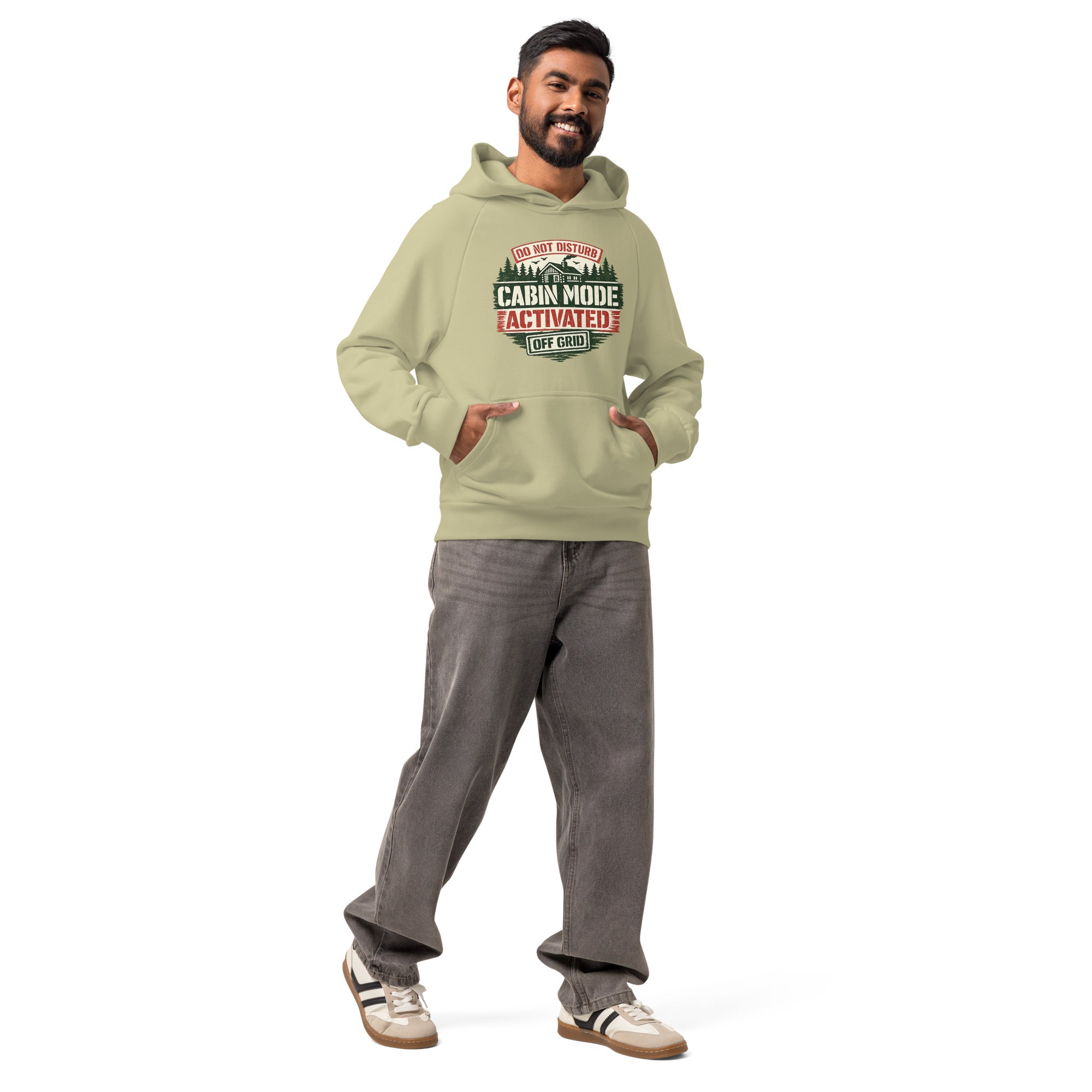 Unisex heavyweight hoodie in sage green with front Cabin Mode Activated graphic