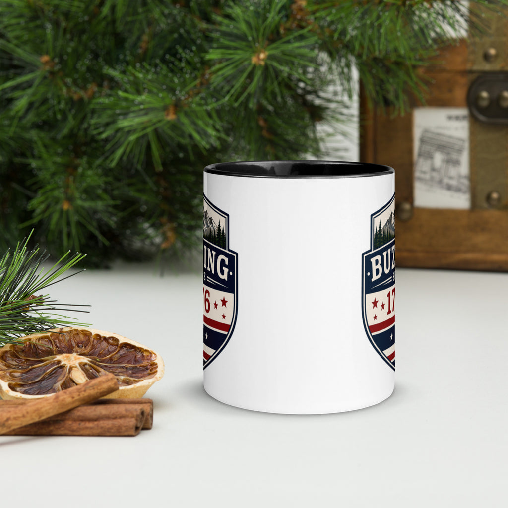White ceramic mug with printed badge design and black interior rim