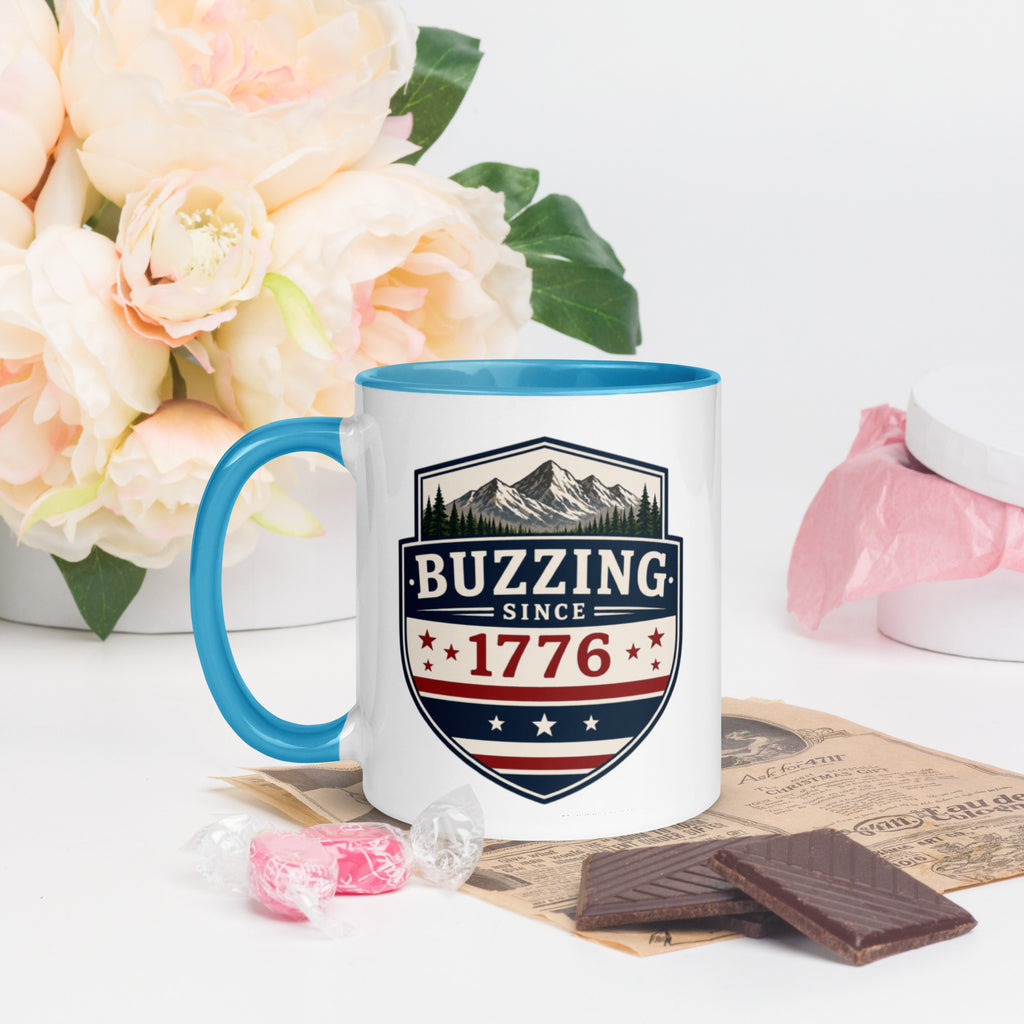Ceramic mug with patriotic shield print, blue rim and handle