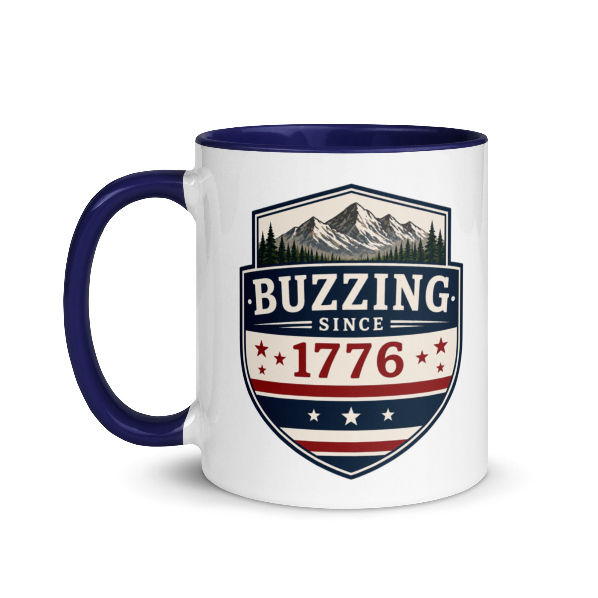 Two-tone coffee mug with dark blue interior and handle, featuring mountain shield logo.