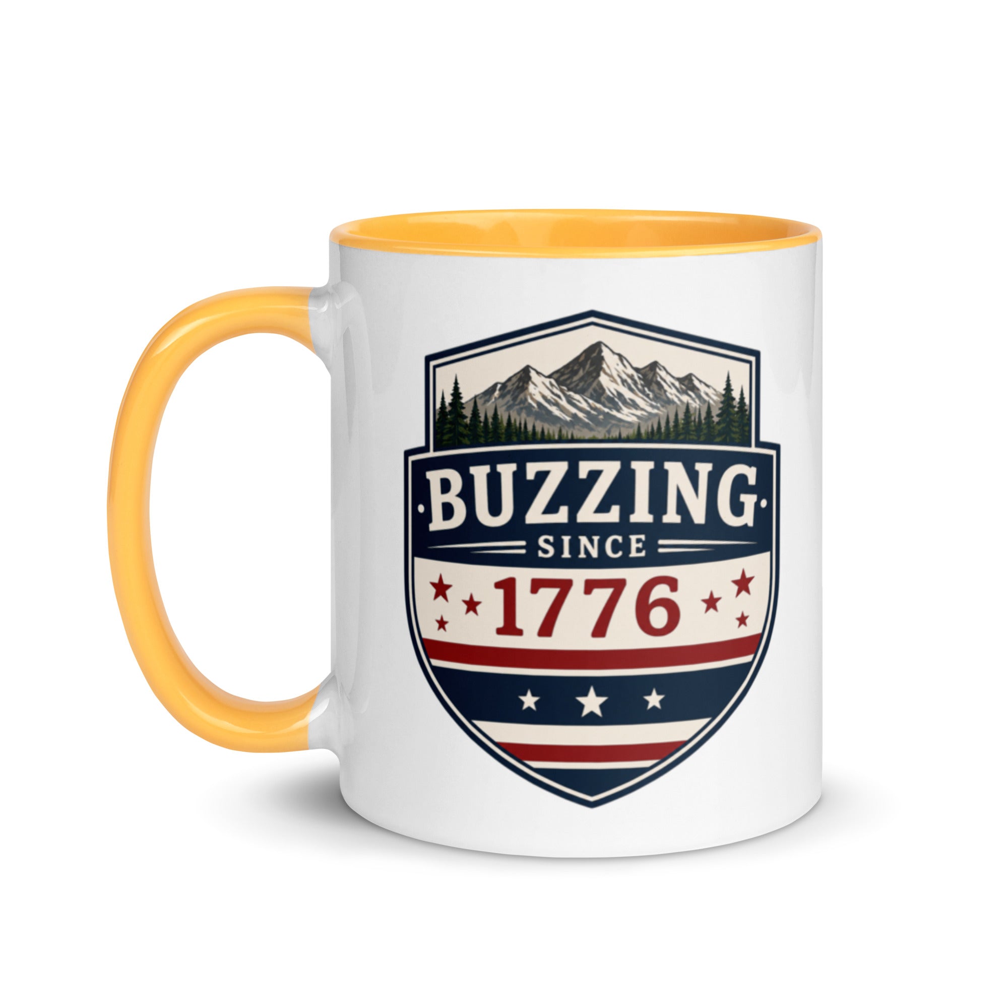 Two-tone coffee mug with golden yellow interior and handle, featuring mountain shield logo.