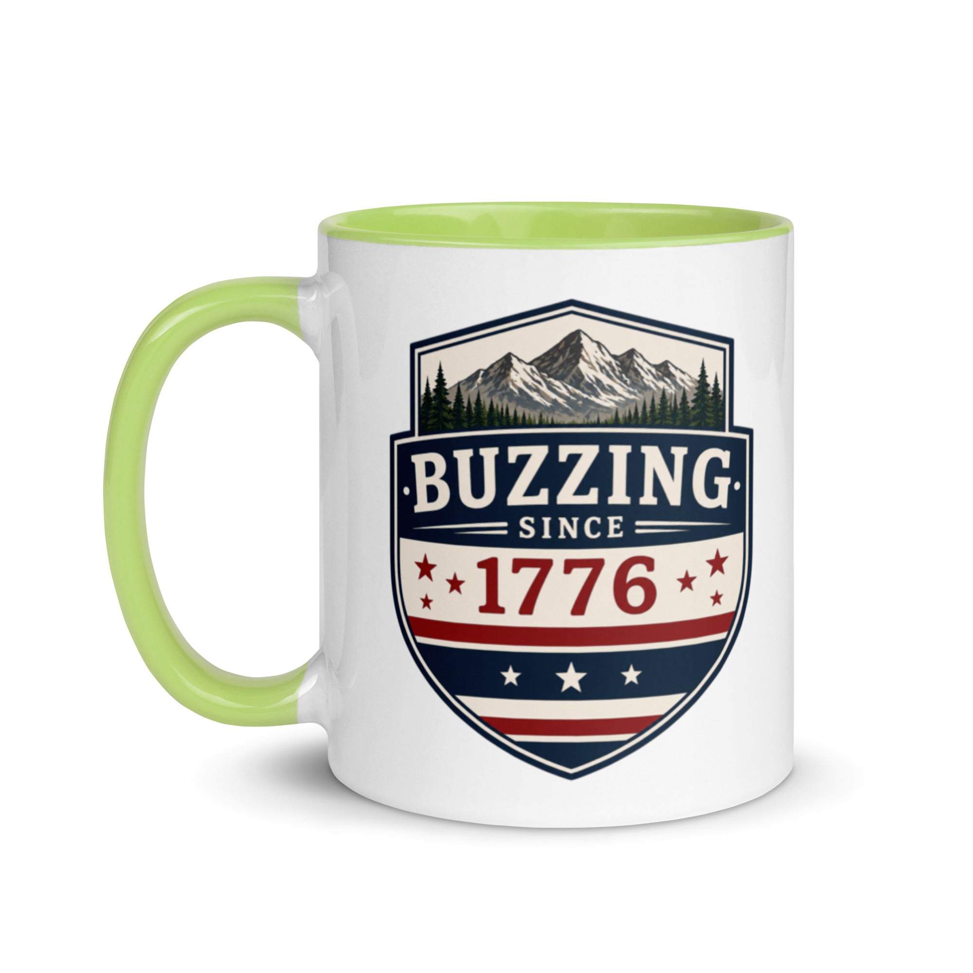 Two-tone coffee mug with green interior and handle, featuring mountain shield logo.