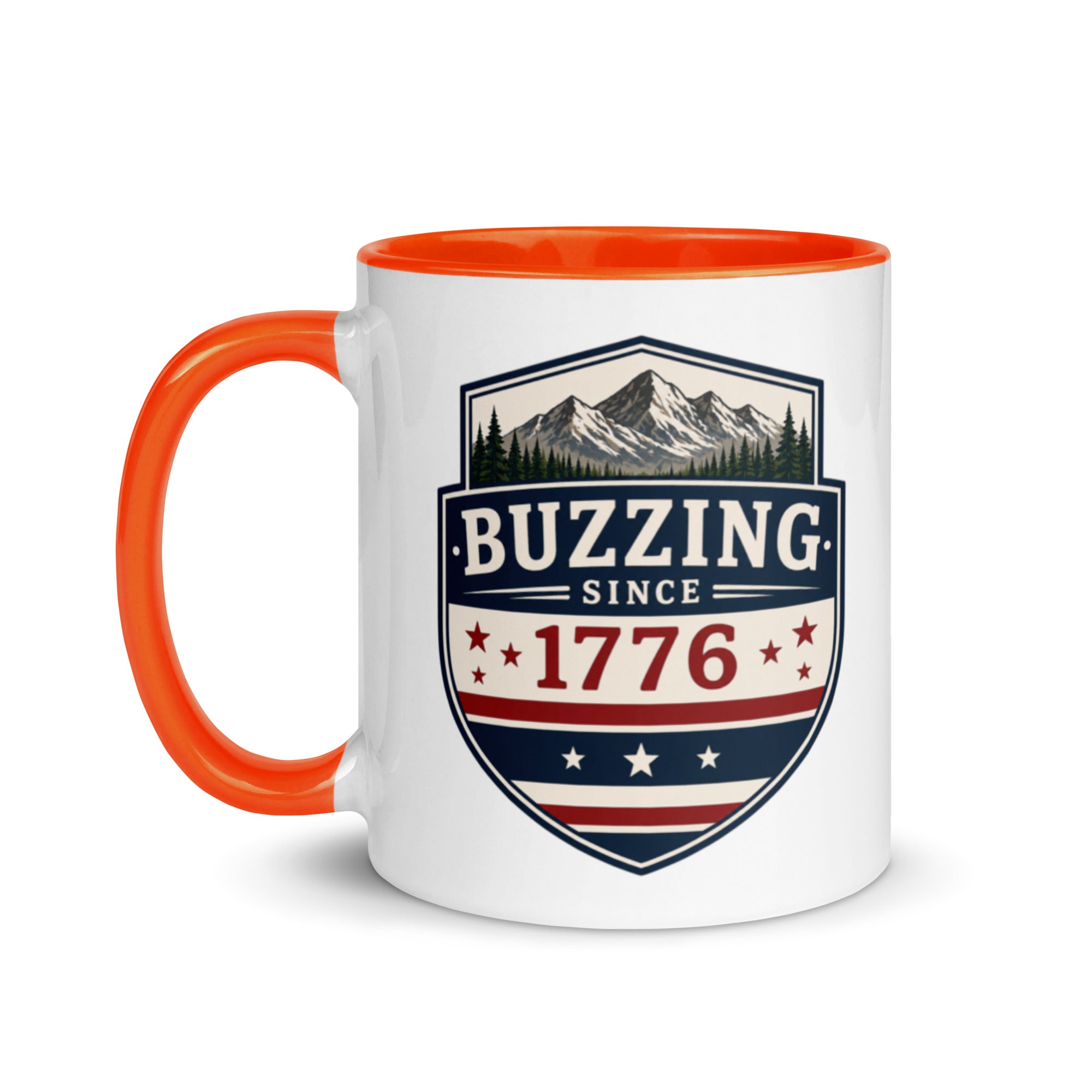 Two-tone coffee mug with orange interior and handle, featuring mountain shield logo.
