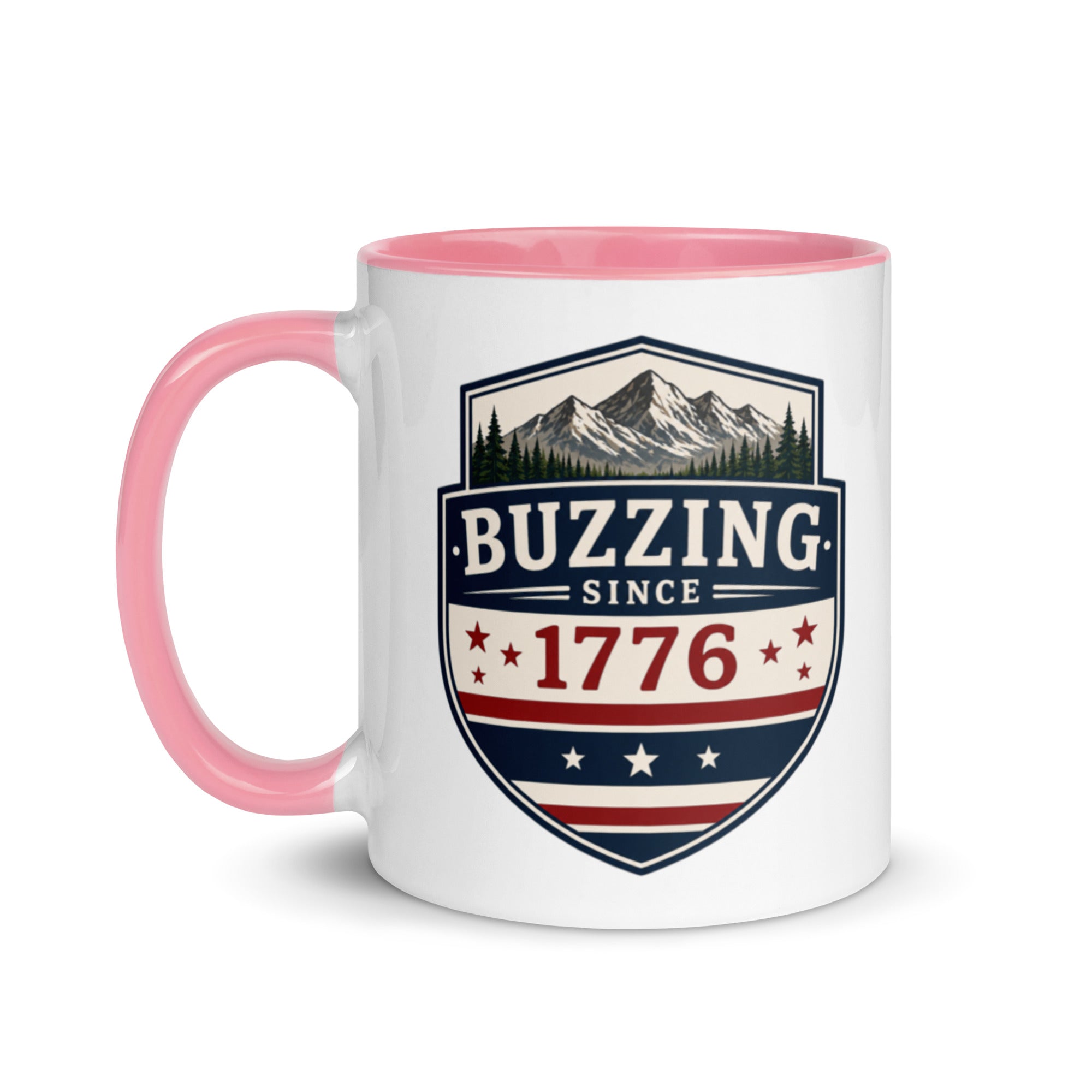 Two-tone coffee mug with pink interior and handle, featuring mountain shield logo.
