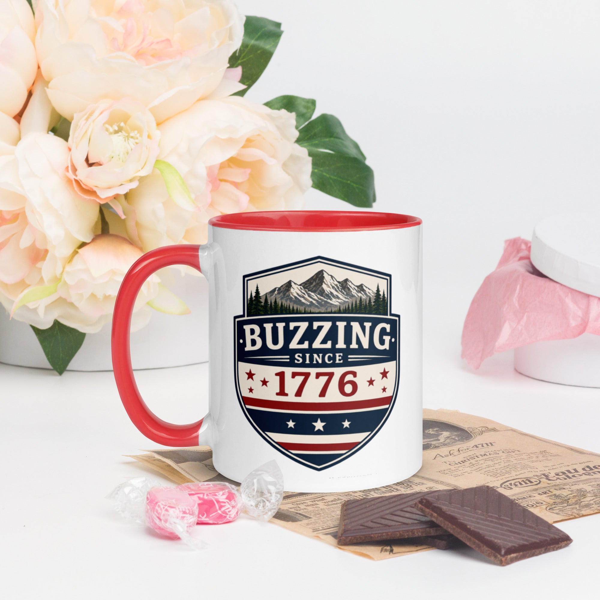 Ceramic mug with patriotic shield print, red rim and handle