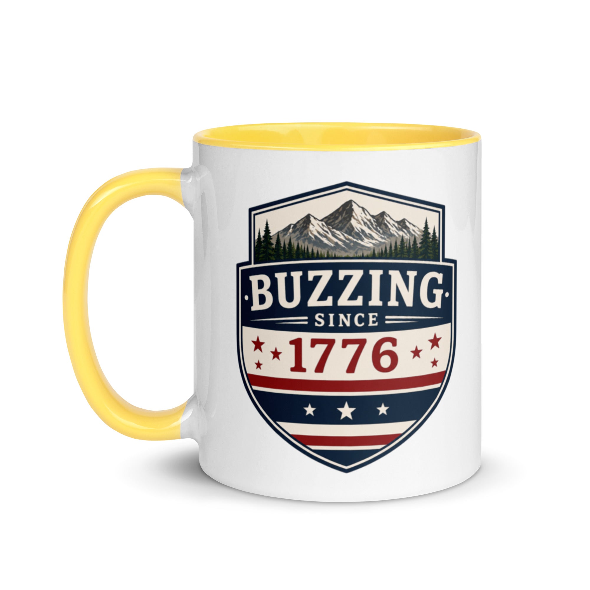 Two-tone coffee mug with yellow interior and handle, featuring mountain shield logo.