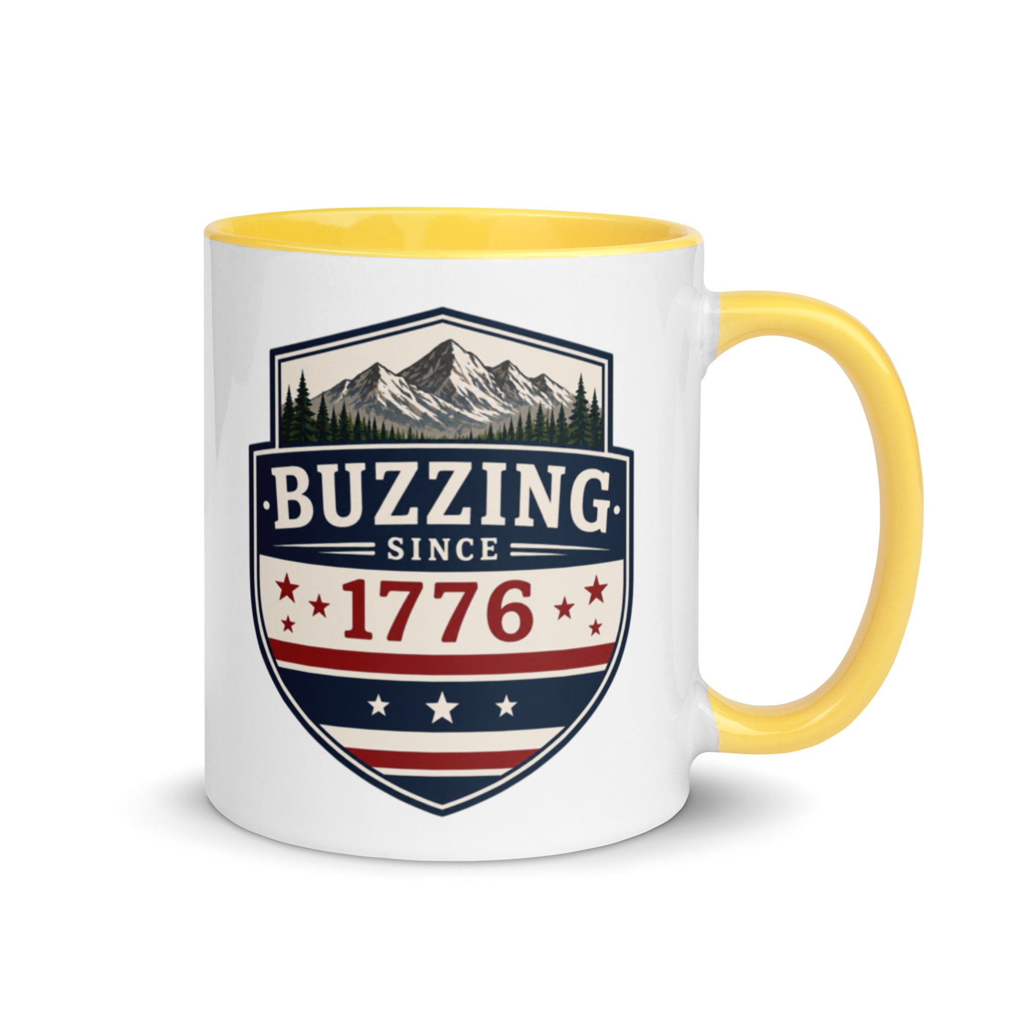Coffee mug with yellow interior and handle; “Buzzing Since 1776” graphic