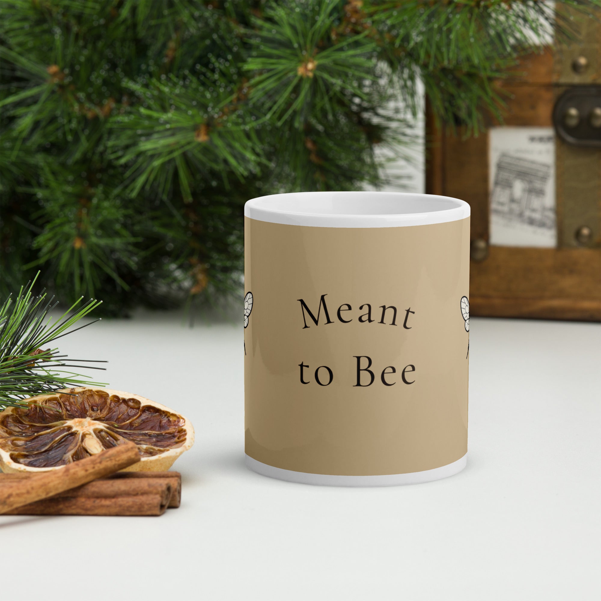 Beige ceramic mug with “Meant to Bee” text and bee illustration