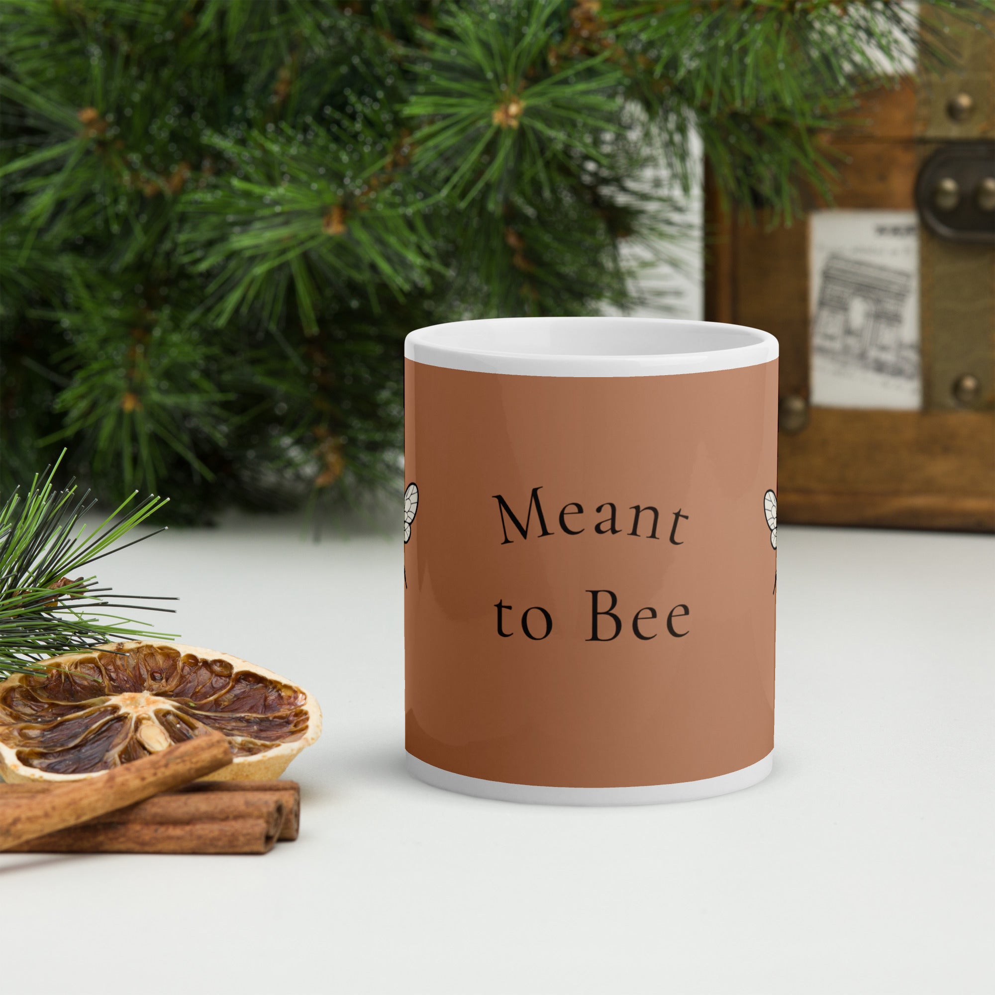 Brown ceramic mug with "Meant to Bee" text on front; upright view