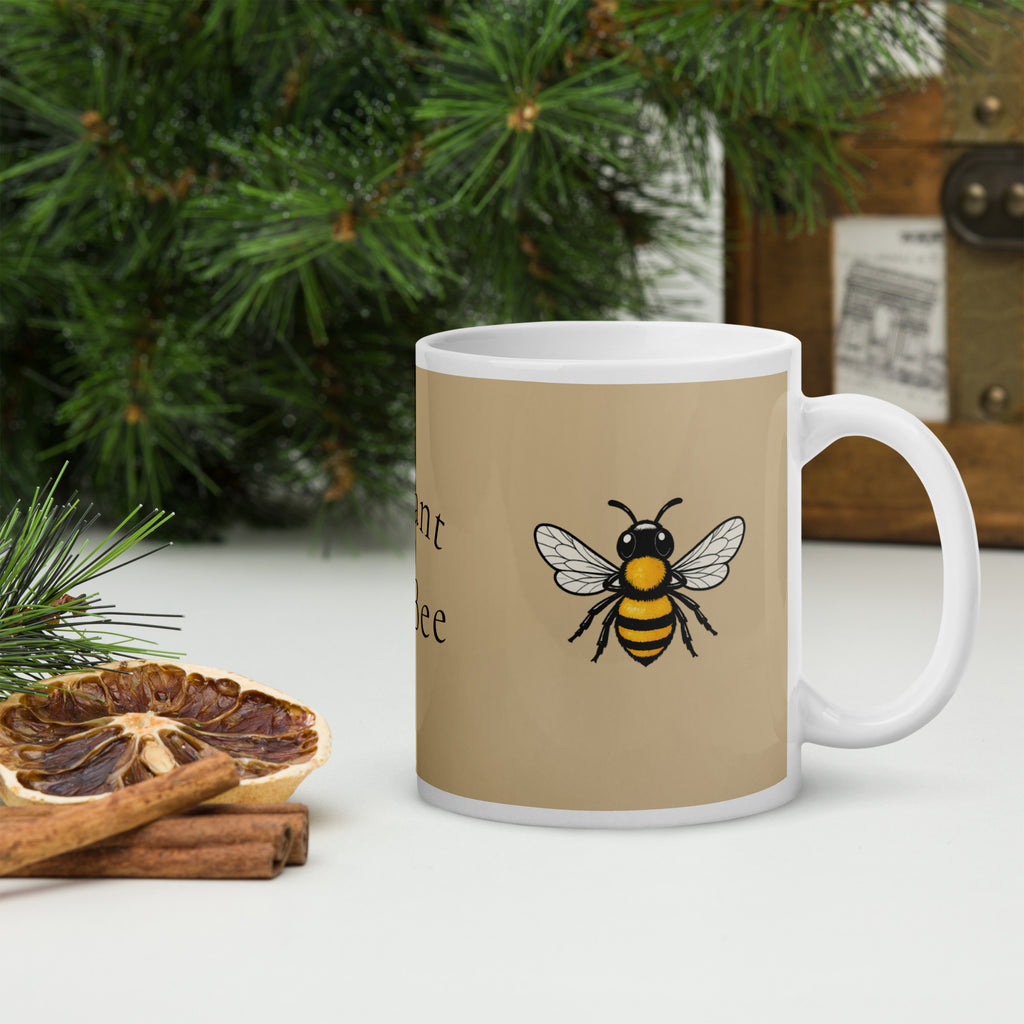 Beige ceramic coffee mug with bee illustration and white handle