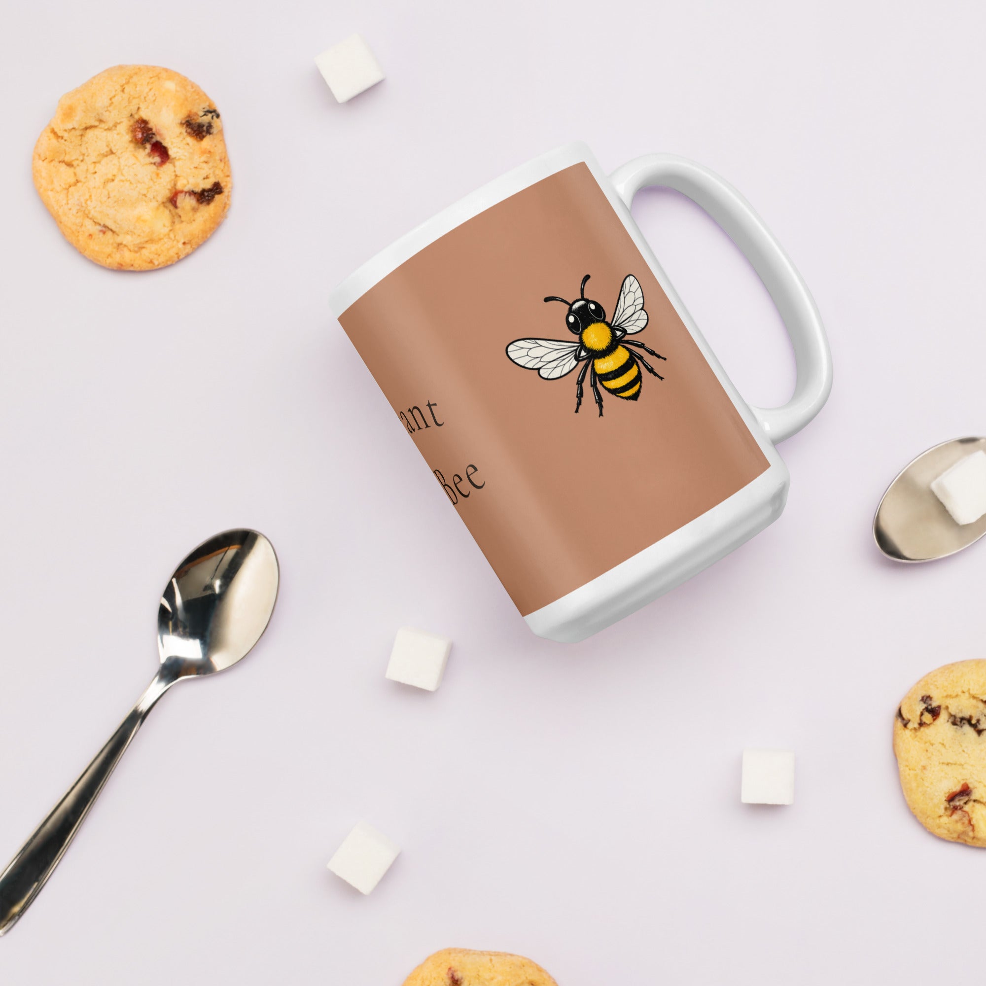 Brown ceramic mug with bee illustration; top-down view of front