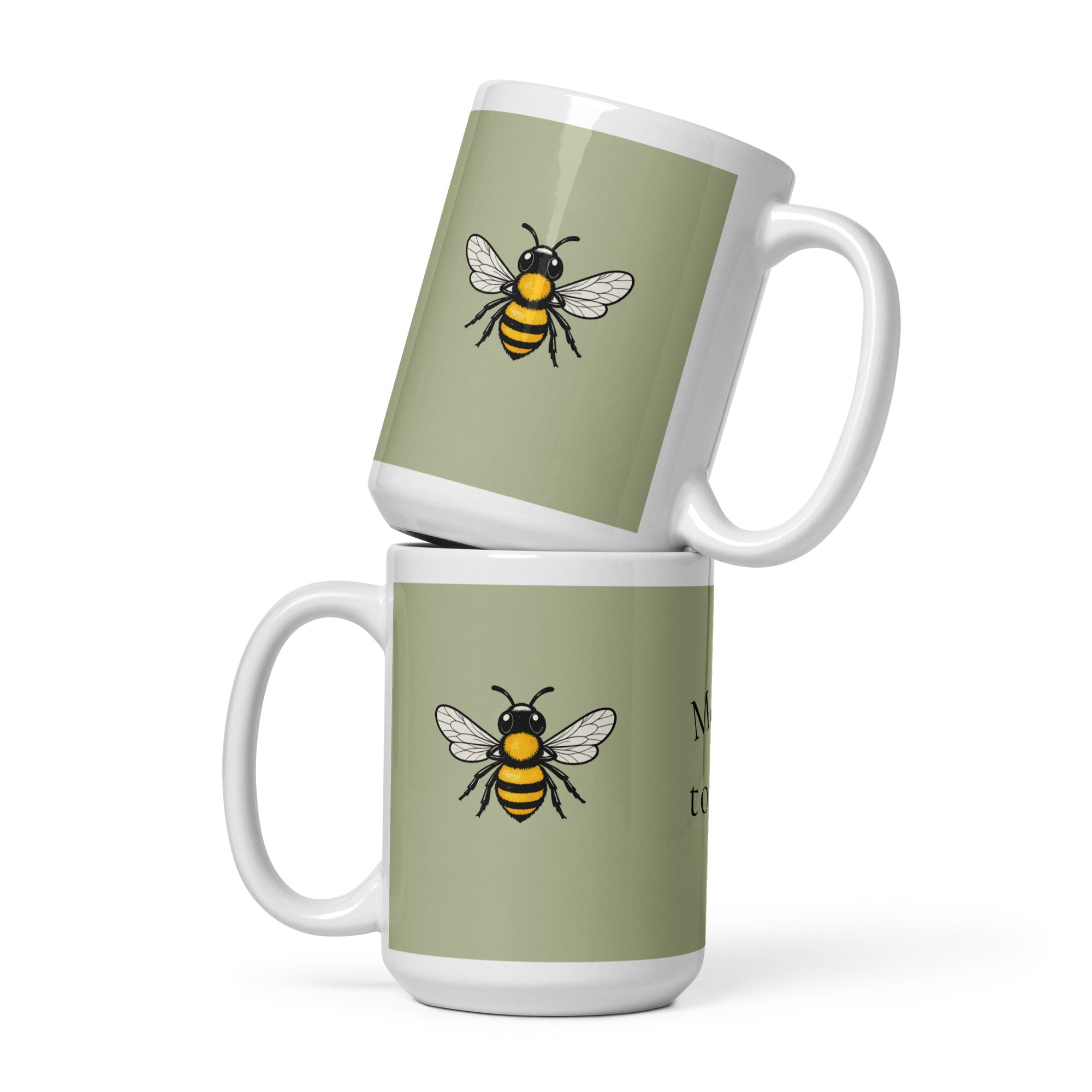 Sage green ceramic coffee mug set, white handle, bee illustration on front