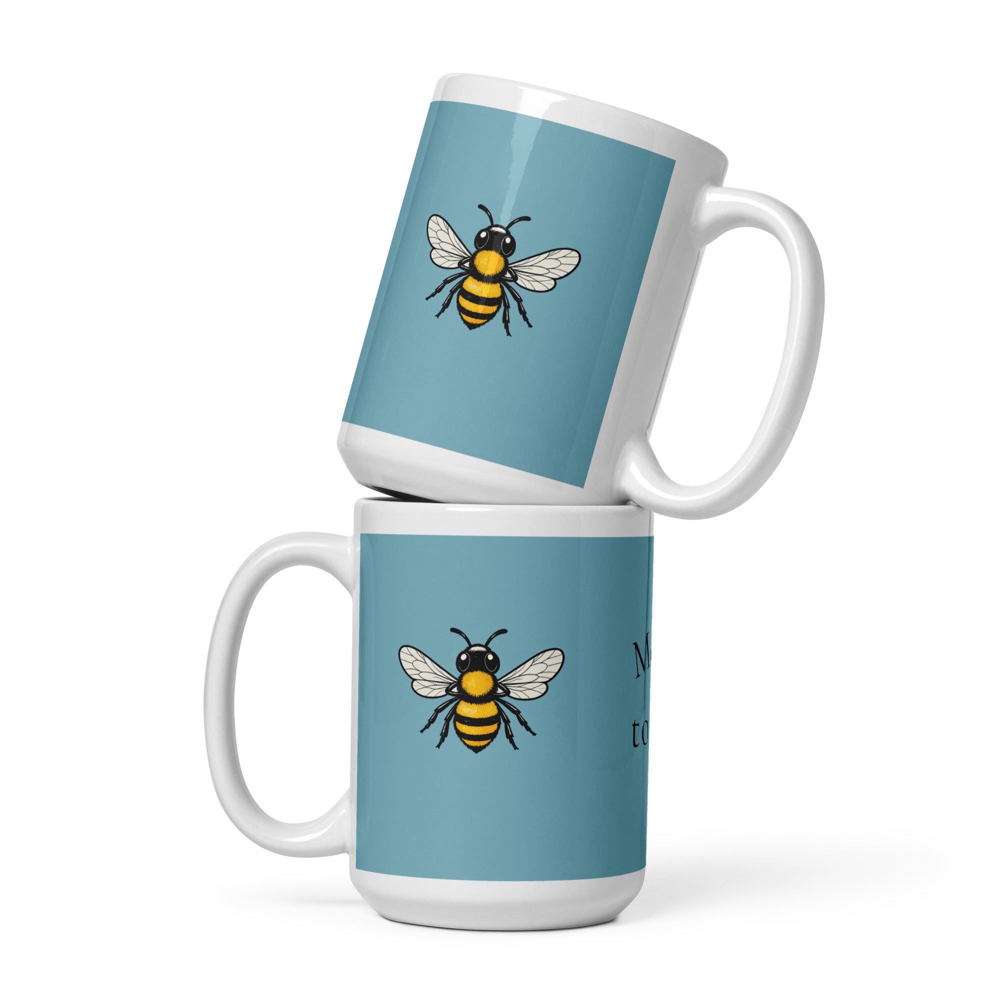 Blue ceramic coffee mug featuring a black-and-yellow bee illustration