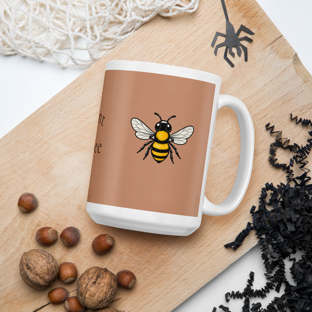 Brown ceramic mug with bee illustration; front view with slight tilt
