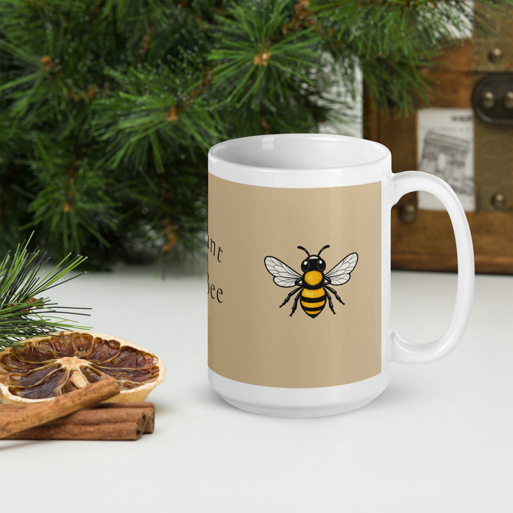 Beige ceramic coffee mug with white handle, bee illustration printed on the front