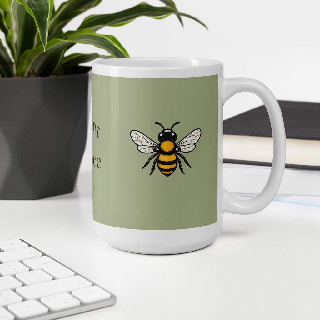 Sage green ceramic coffee mug with bee illustration, front view with handle