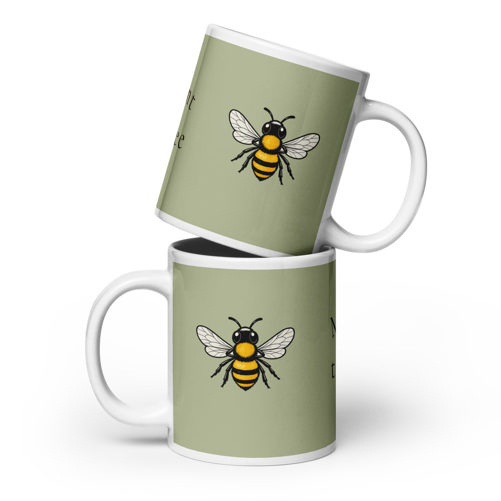 Sage green ceramic coffee mug set, white handle, centered bee illustration