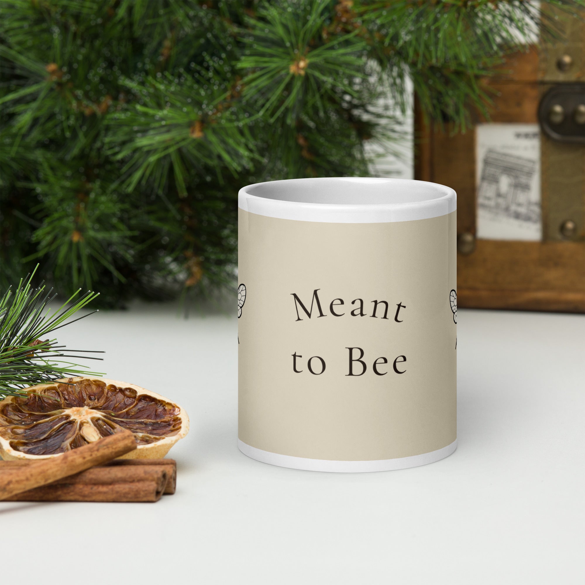 Light beige ceramic mug with 'Meant to Bee' text on front and white handle
