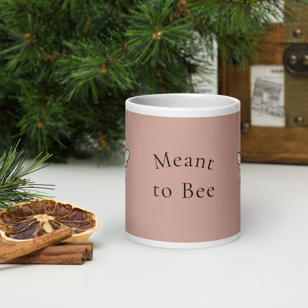 Dusty rose ceramic coffee cup with 'Meant to Bee' text