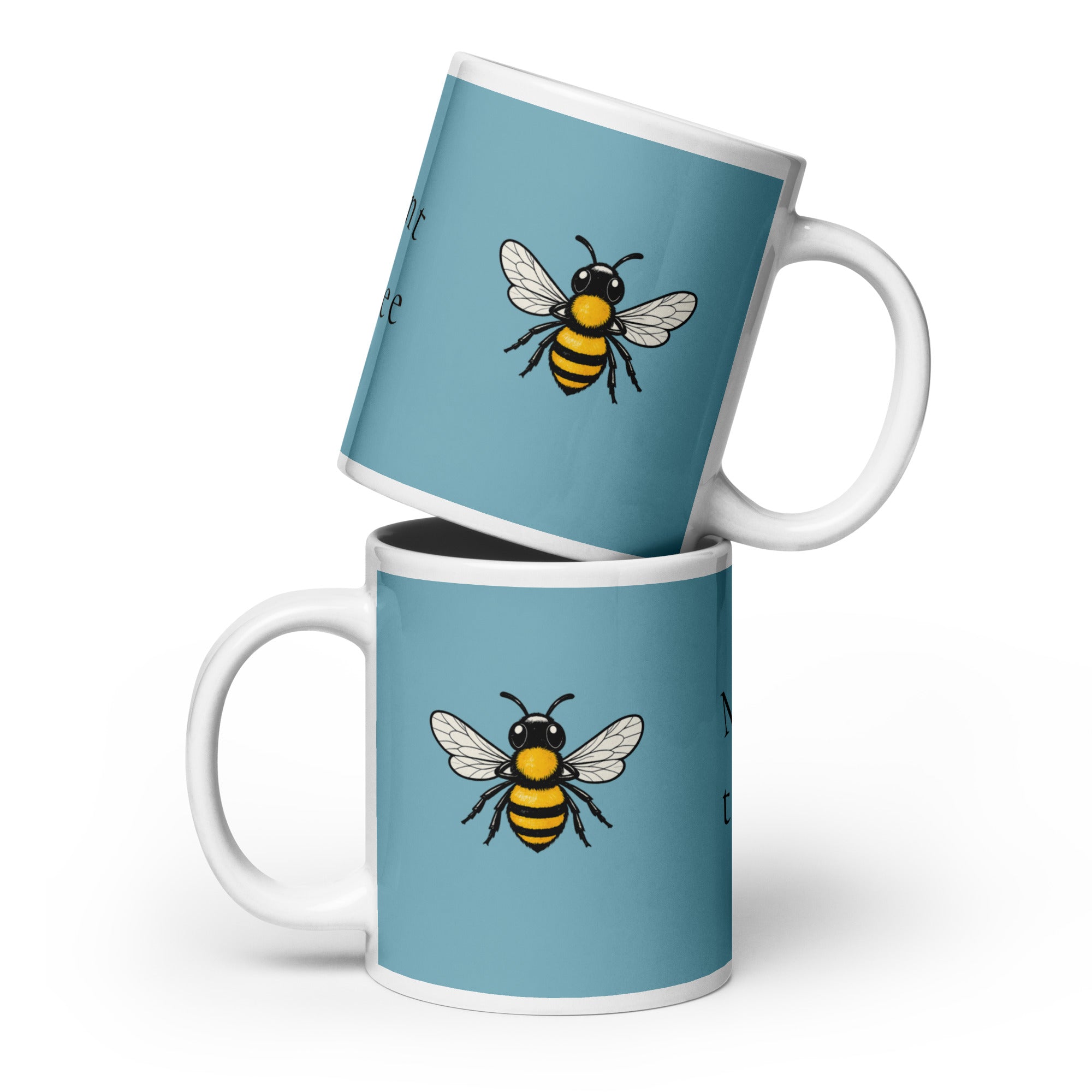 Blue ceramic coffee mug with centered bee illustration and white rim